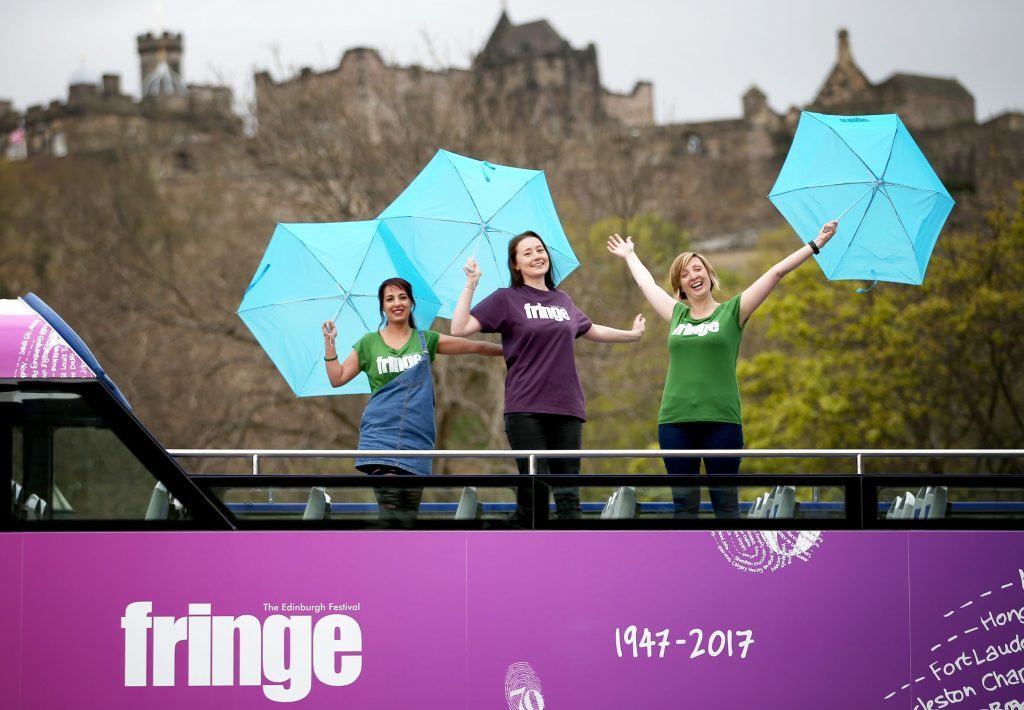 (left to right) Navida Galbraith, Rachael Cowie and Elizabeth Burchill from the Edinburgh Festival Fringe Society, help launch the inaugural World Fringe Day in Edinburgh. (Jane Barlow/PA Wire)