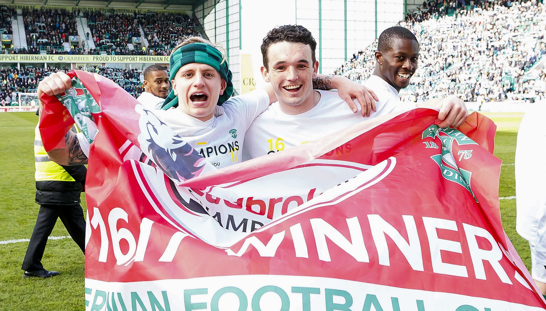 Hibernian's Jason Cummings and John McGinn celebrate the title win at full time (SNS Group)