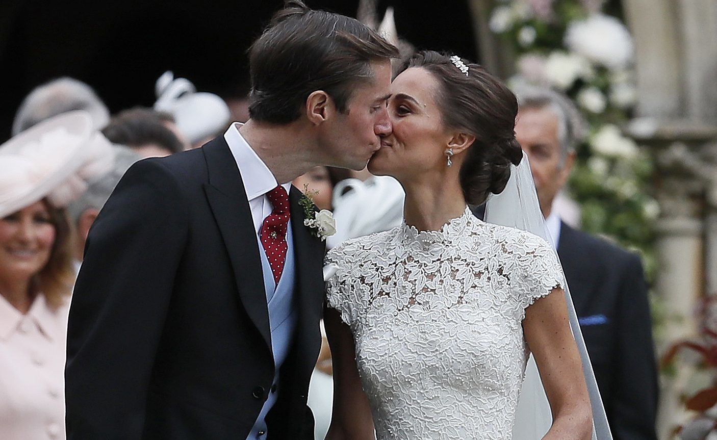Pippa Middleton and James Matthews kiss after their wedding at St Mark's Church (Kirsty Wigglesworth - Pool/Getty Images)