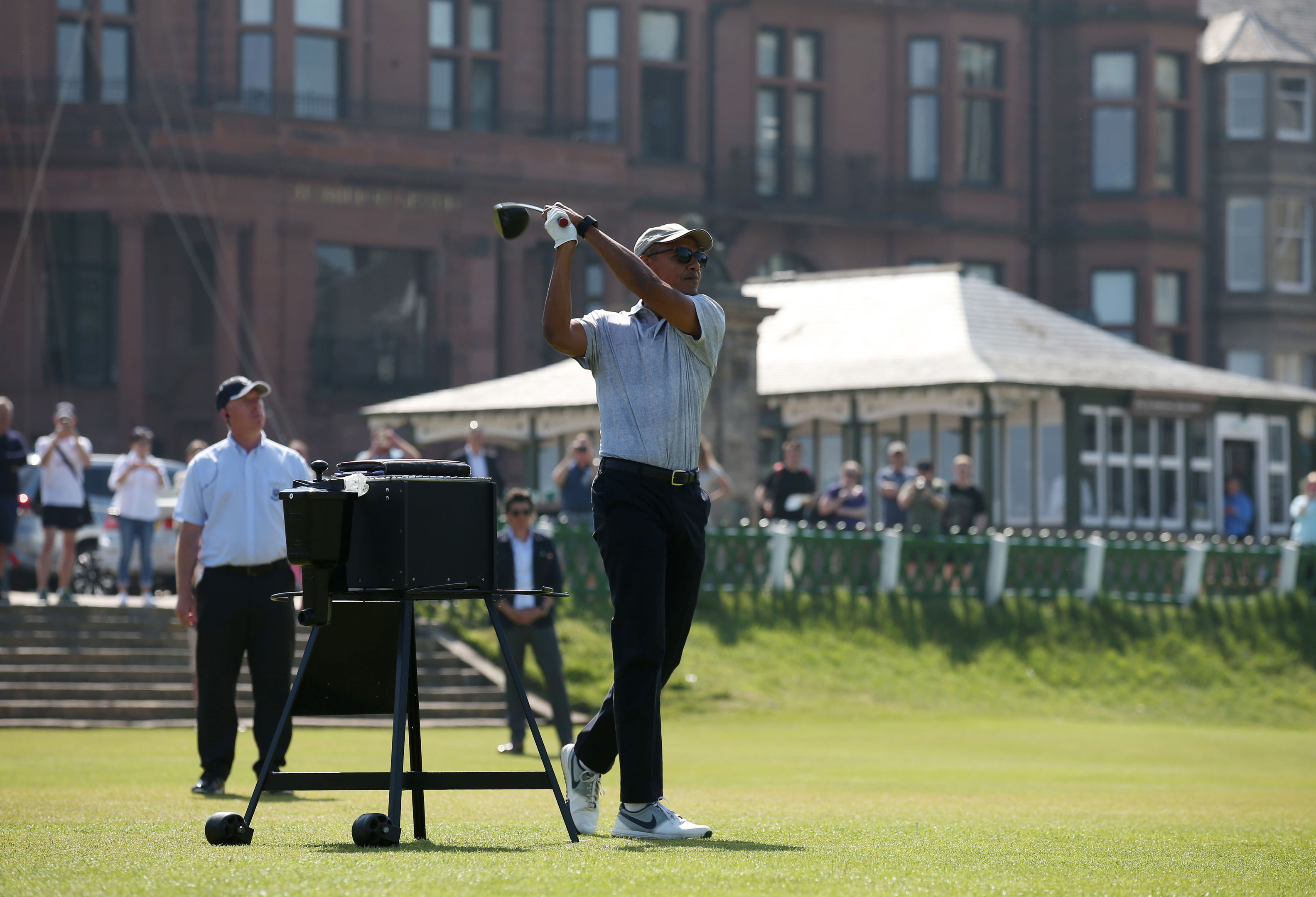 Barack Obama tees off at the first hole at St Andrews Golf Club (Andrew Milligan/PA Wire)