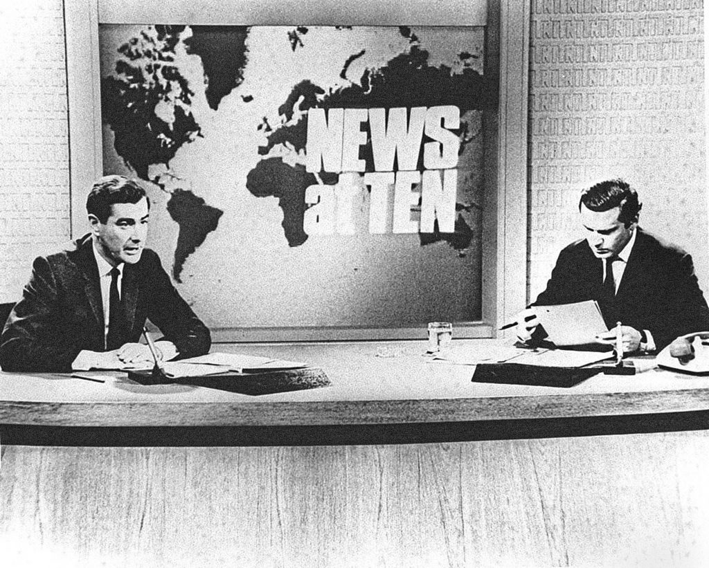 Alastair Burnet and Reginald Bosanquet in the early days of News At Ten (PA)