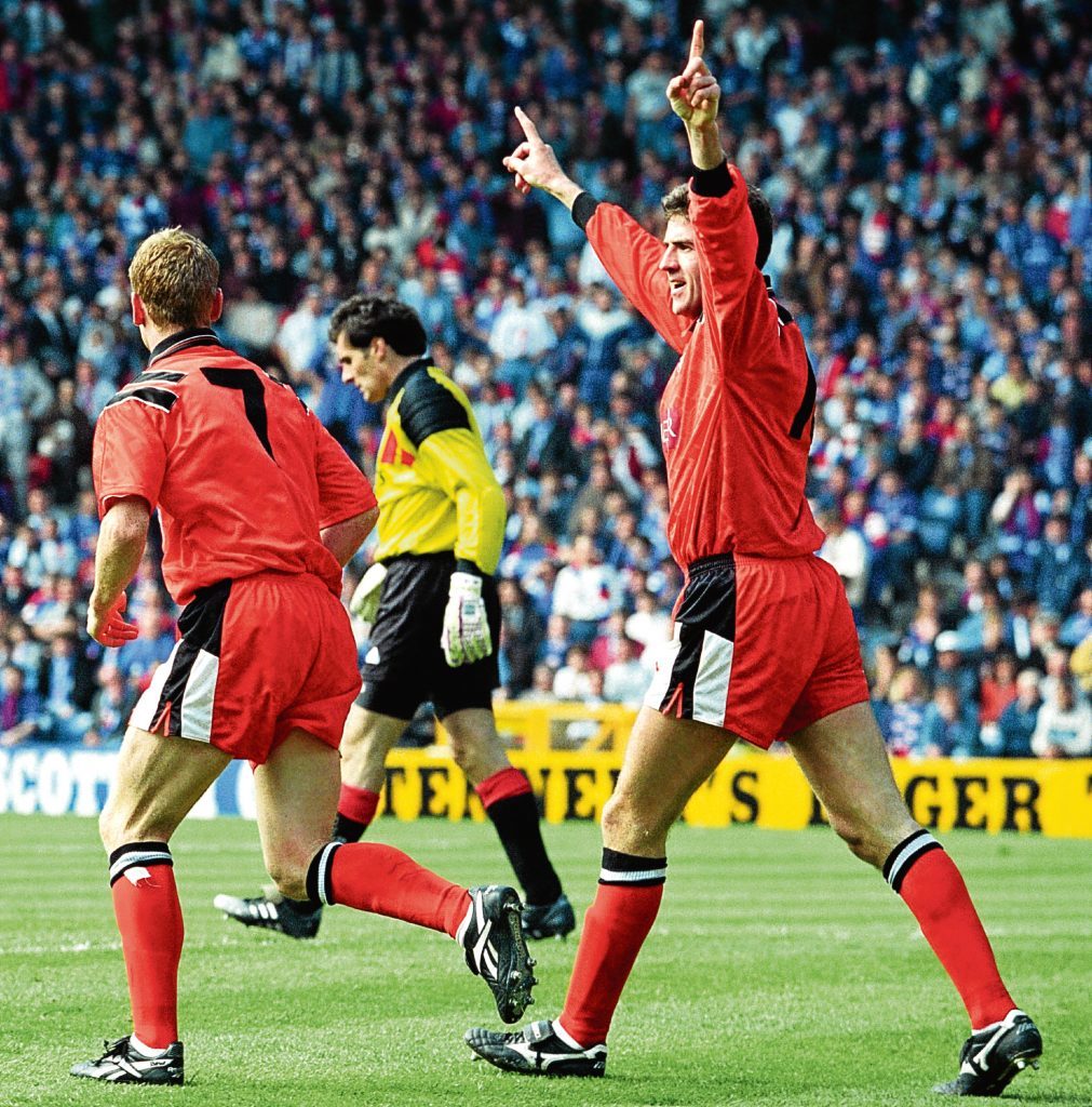 Brewster celebrates after netting the only goal of the match (SNS Group)