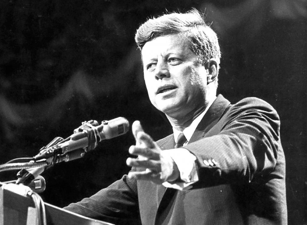 1962:  US statesman John F Kennedy, 35th president of the USA, making a speech.  (Photo by Central Press/Getty Images)