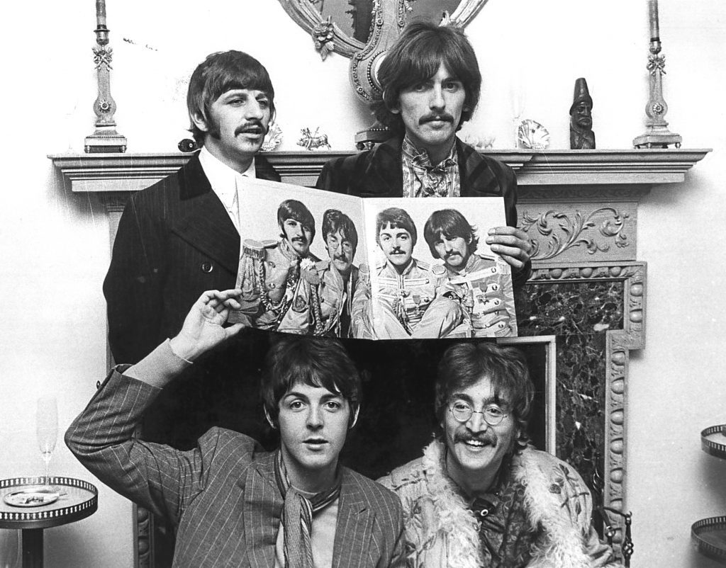 22nd May 1967:  The Beatles pose for a photocall to promote the album (John Pratt/Keystone/Getty Images)