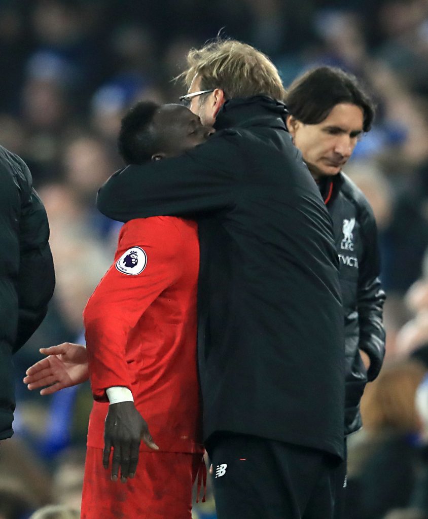 Liverpool's Sadio Mane and manager Jurgen Klopp embrace after the final whistle against Everton (Mike Egerton/PA Wire)