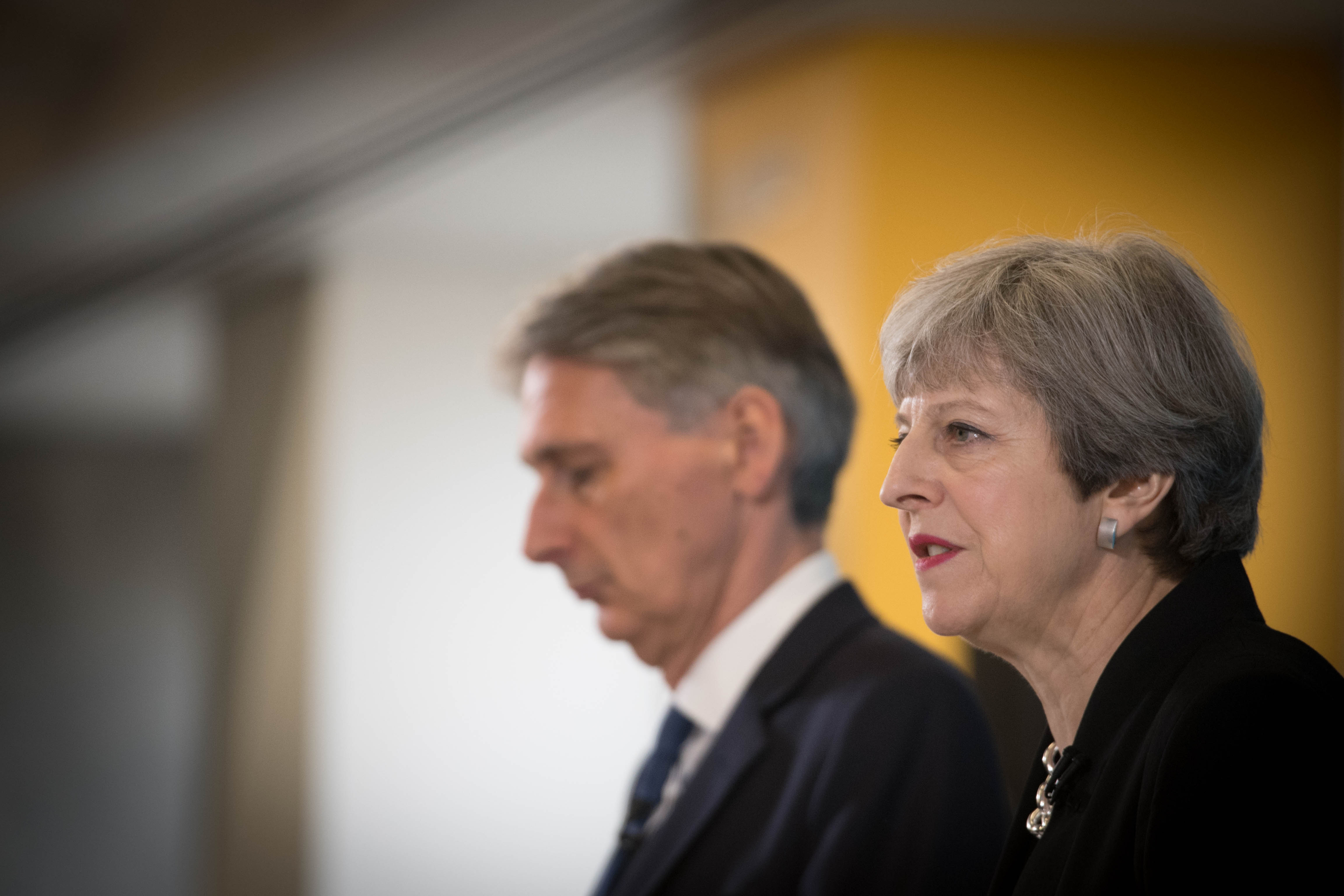 Conservative party leader Theresa May and Chancellor Philip Hammond during a general election campaign (Stefan Rousseau/PA Wire)