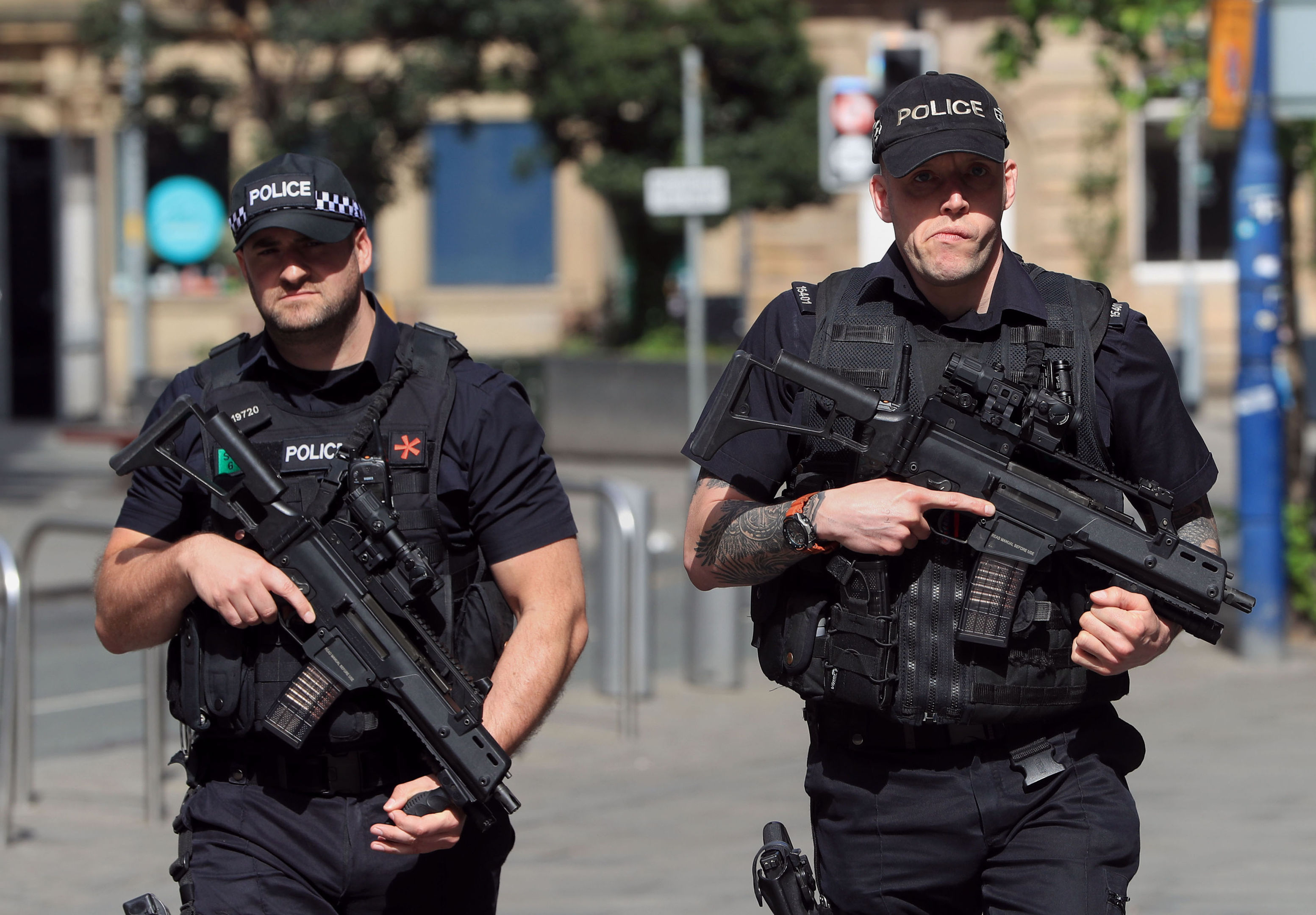 Armed police close to the Manchester Arena, the morning after a suicide bomber killed 22 people, including children, as an explosion tore through fans leaving a pop concert in Manchester (Danny Lawson/PA Wire)