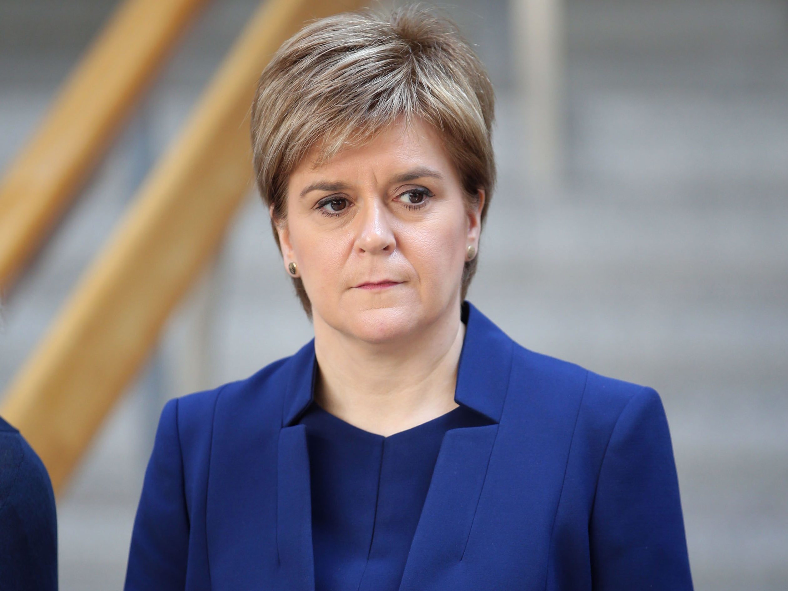 First Minister Nicola Sturgeon joins colleagues in observing a minute's silence to remember the victims of the terror attack in Manchester earlier this week (Jane Barlow/PA Wire)