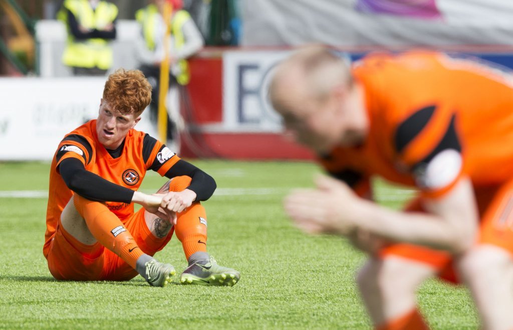 Dejection at full-time for Dundee United's Simon Murray (L) and Willo Flood (SNS Group)