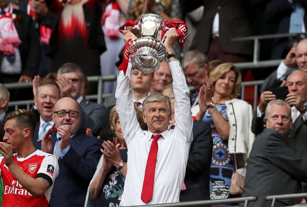 Arsene Wenger lifts the FA Cup (Adam Davy/PA Wire)
