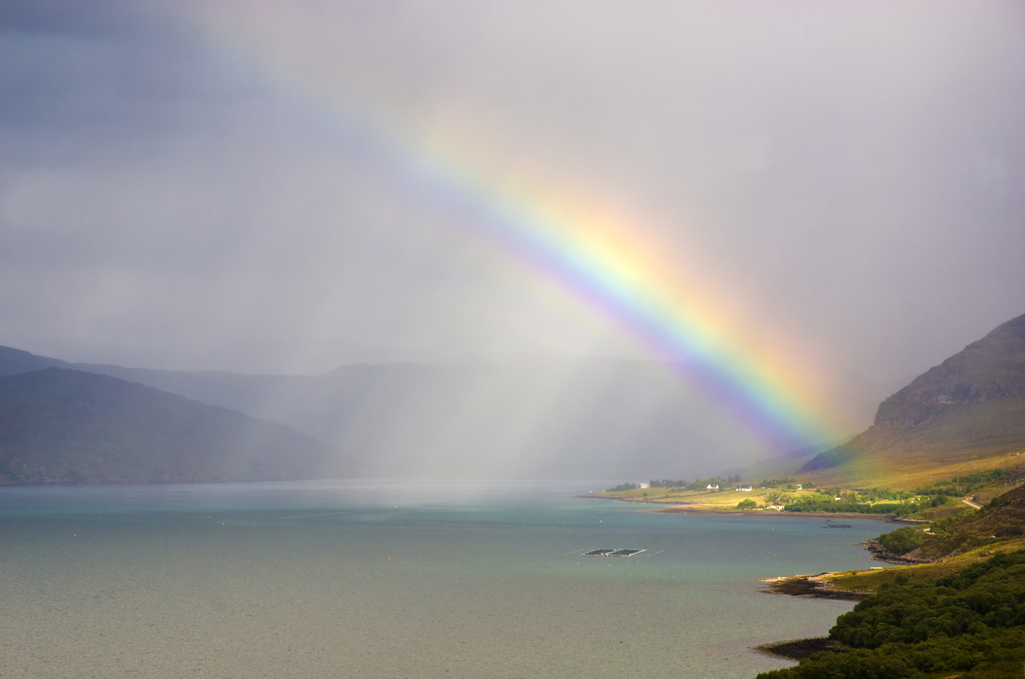 Rainbow lighting up Ardessie on Little Loch Broom in the highlands of Scotland (Getty Images)