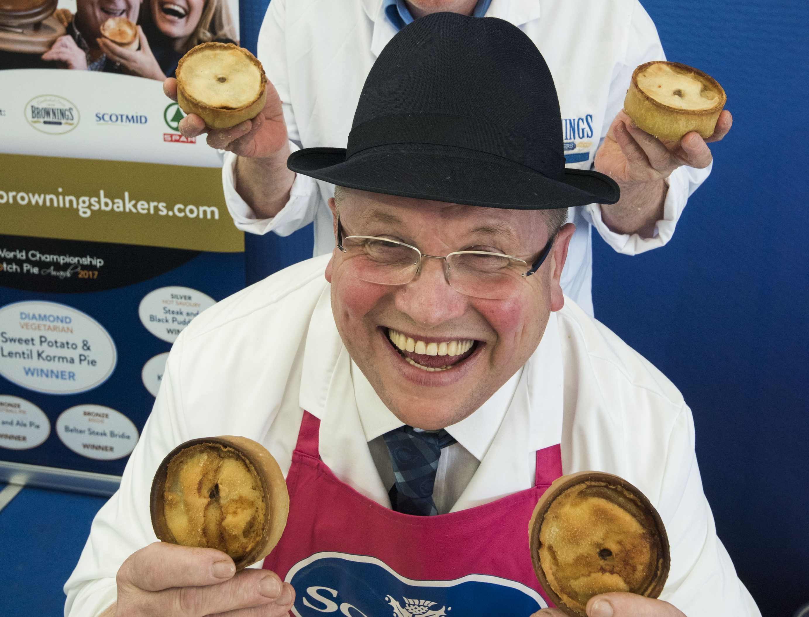 The pies have it! Paul Boyle, front, beat John Gall to the Best Pie title.