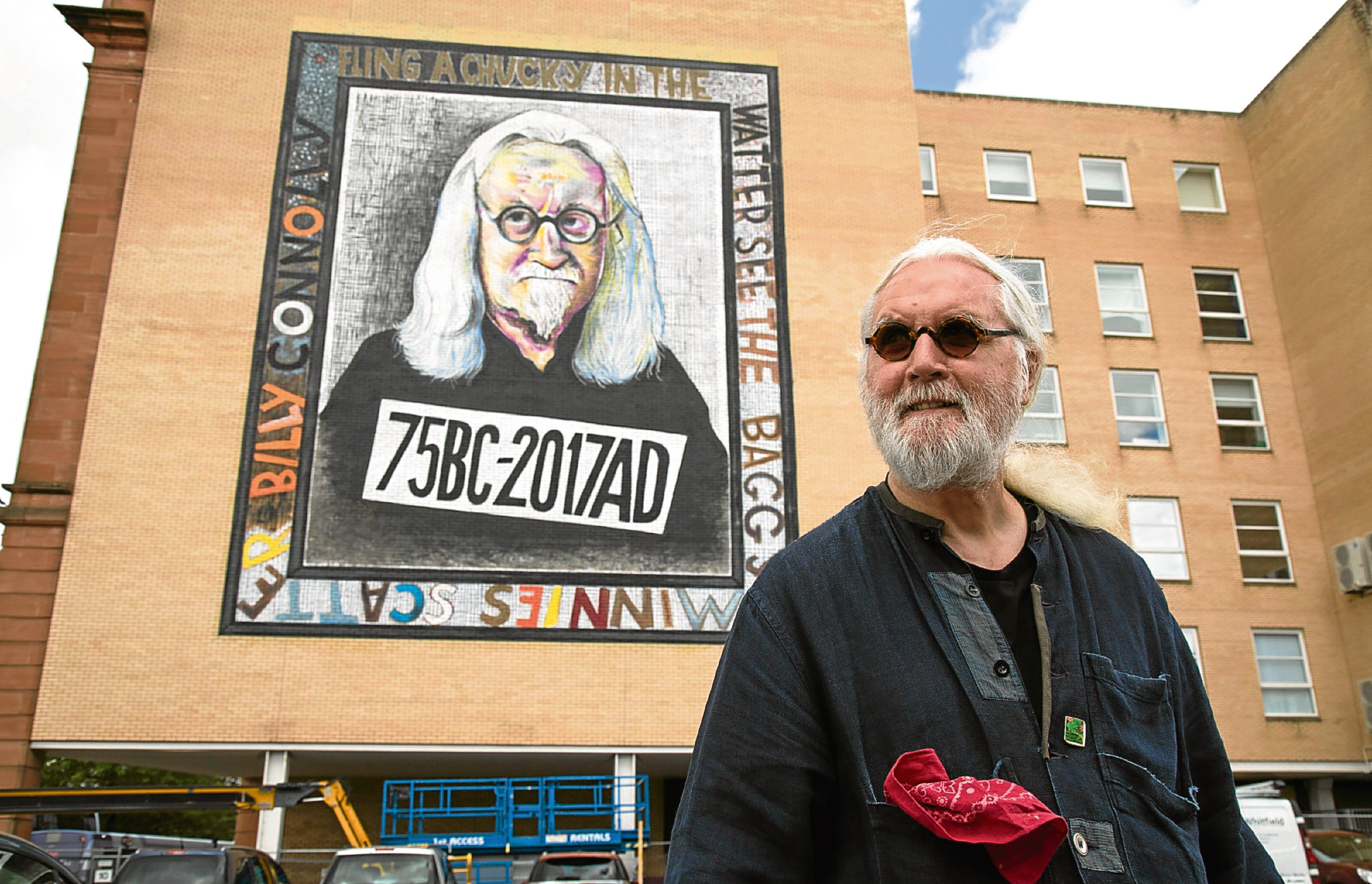 Billy Connolly tours the giant murals of him in Glasgow (BBC)