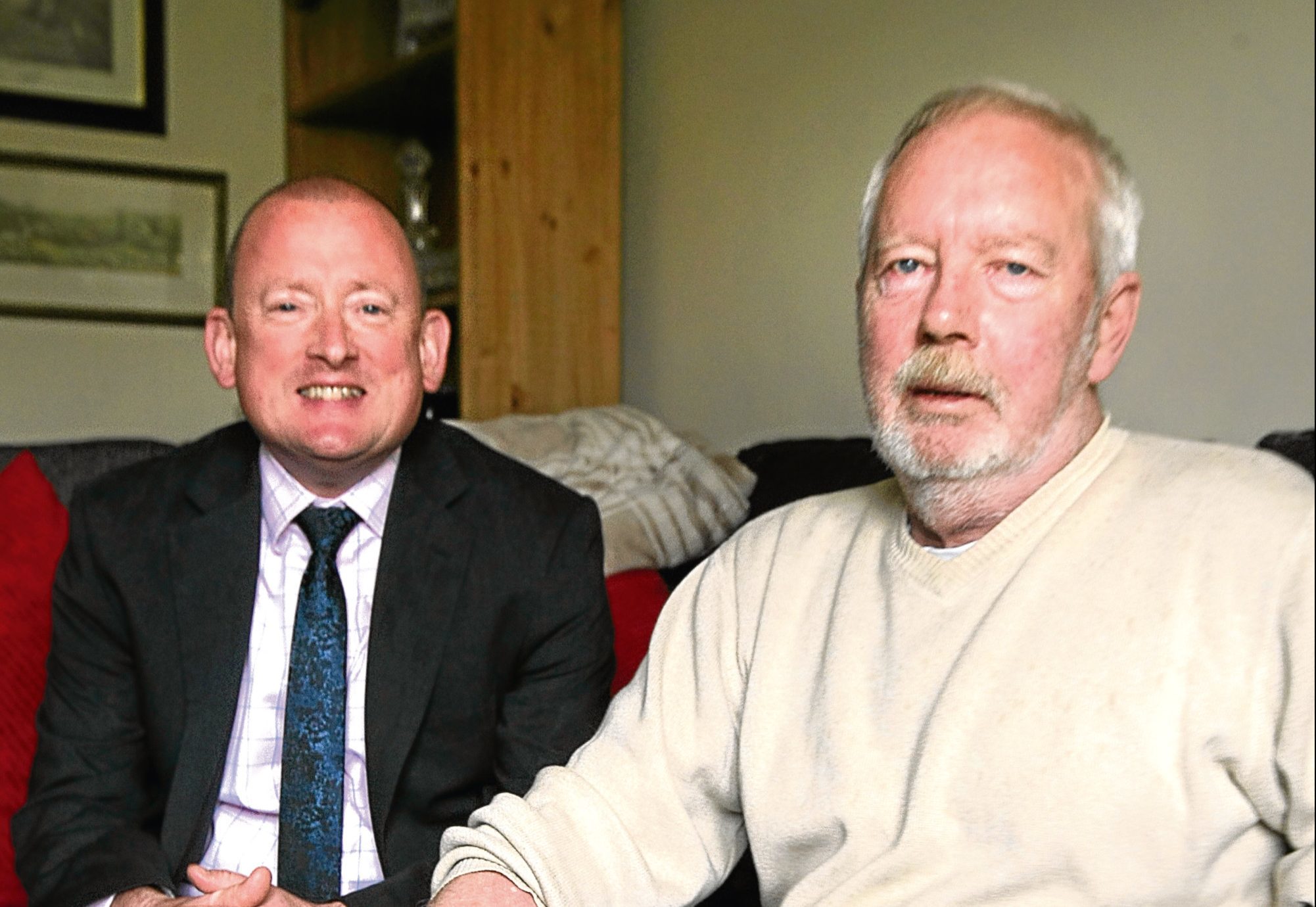 Neil McKinnon with Joseph ONeill at his home in Douglas, Dundee (Kris Miller / DC Thomson)
