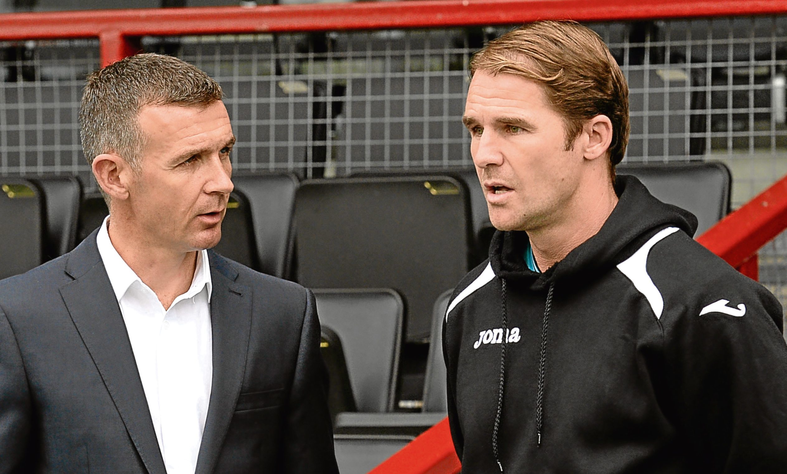 Ross County manager Jim McIntyre (left) chats with Partick manager Alan Archibald (SNS)