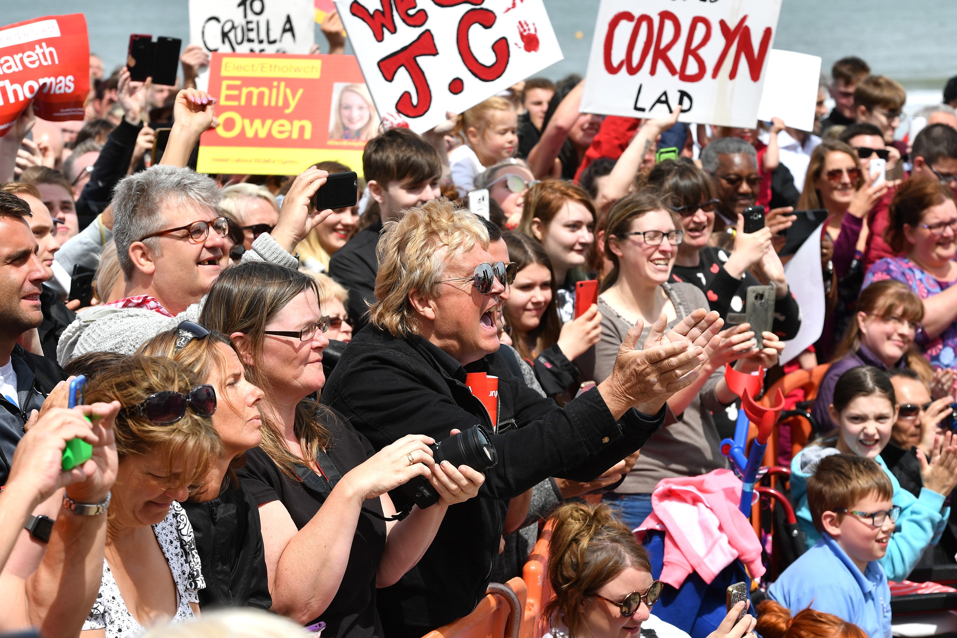 Supporters applaud as Labour party leader Jeremy Corbyn arrives to speak on the Promenade on June 7, 2017 in Colwyn Bay, Denbighshire, United Kingdom. (Anthony Devlin/Getty Images)