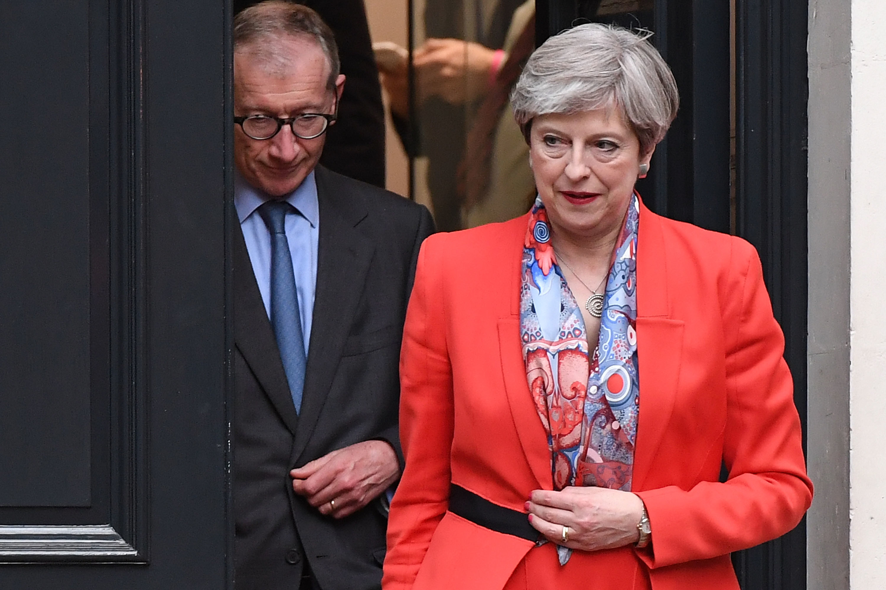 Theresa May leaves Conservative Party Headquarters with her husband Philip (Chris J Ratcliffe/Getty Images)