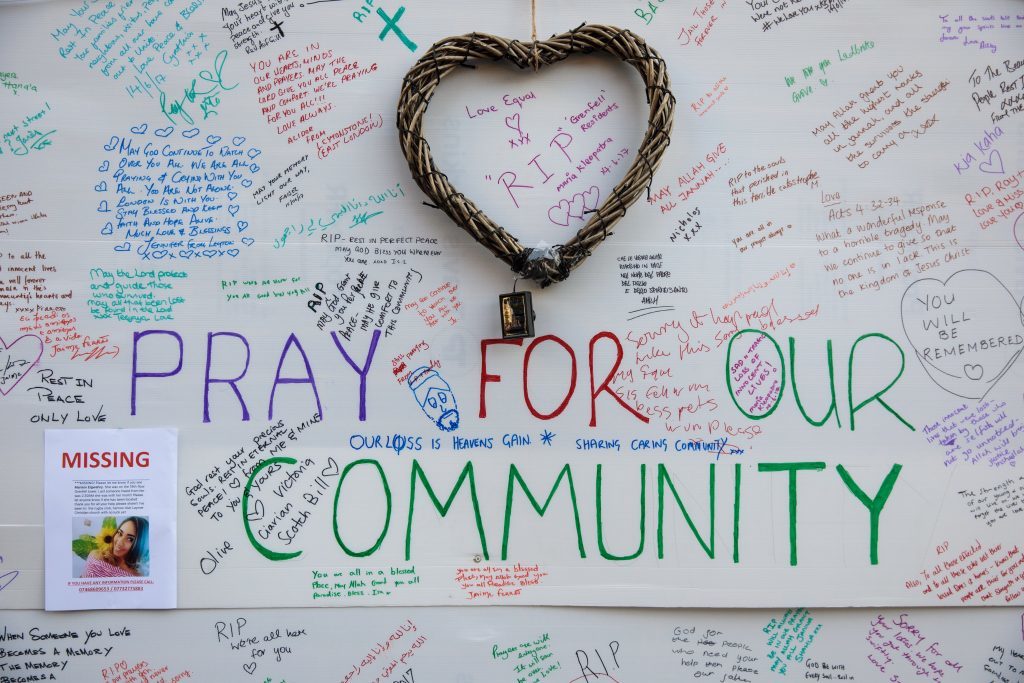 A wall of tributes and messages of condolences for the victims (Jack Taylor/Getty Images)