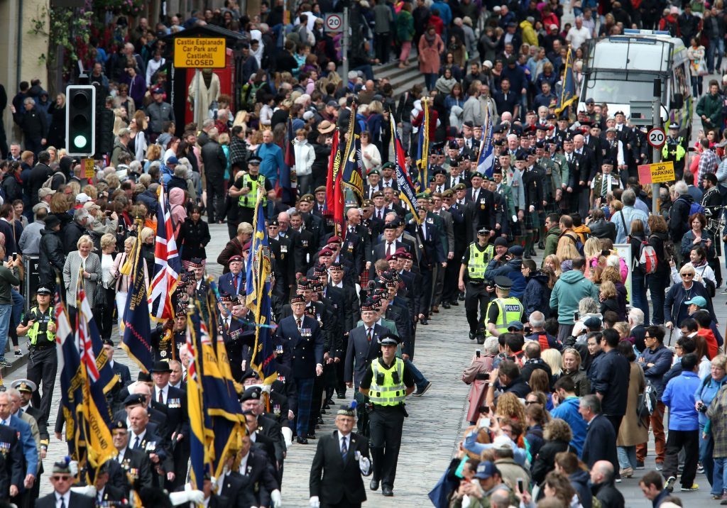 Ex-service personnel from Legion Scotland march down the Royal Mile during the ninth annual Armed Forces Day in Edinburgh, (Andrew Milligan/PA Wire)