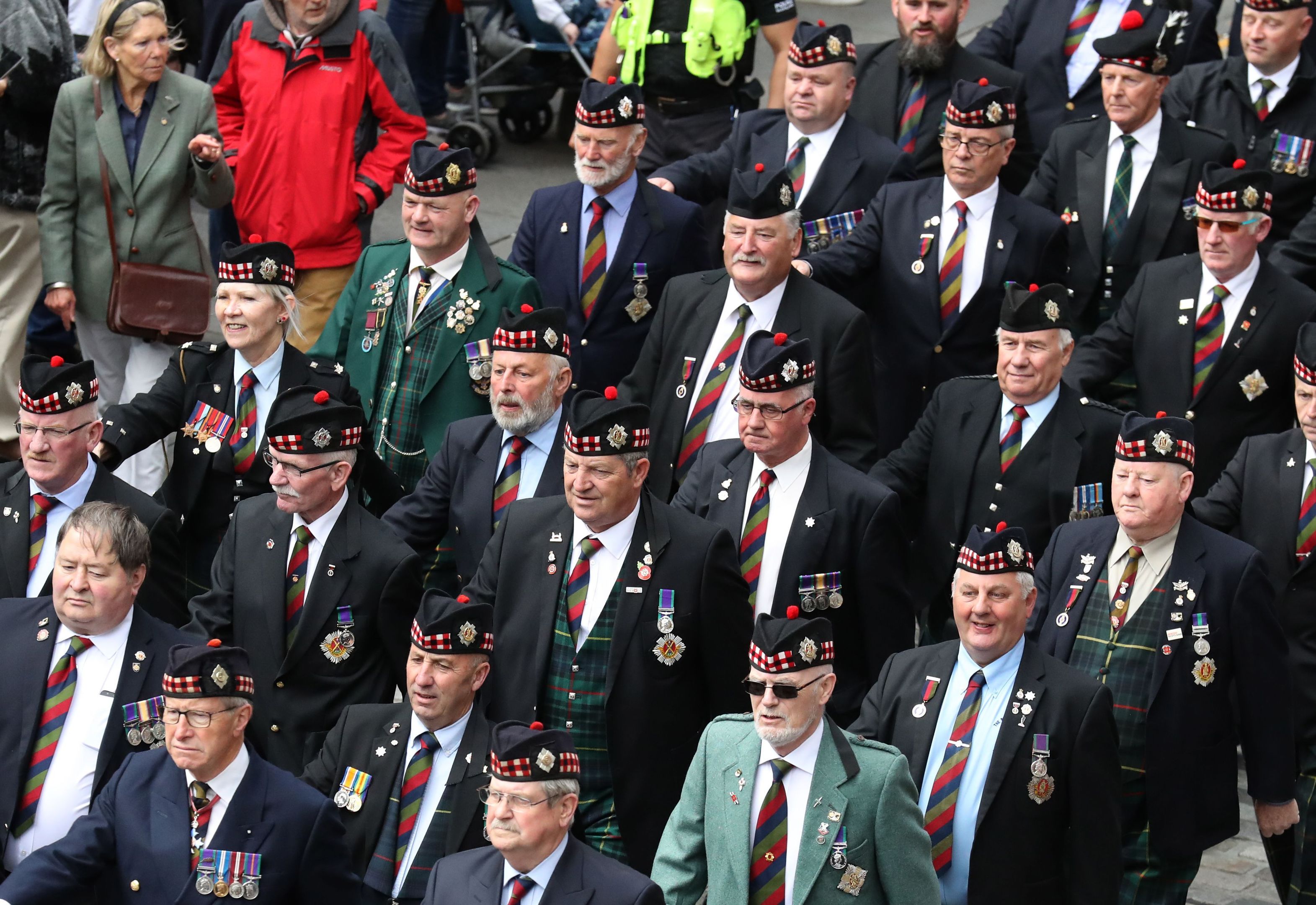 Ex-service personnel from Legion Scotland march down the Royal Mile during the ninth annual Armed Forces Day in Edinburgh (Andrew Milligan/PA Wire)
