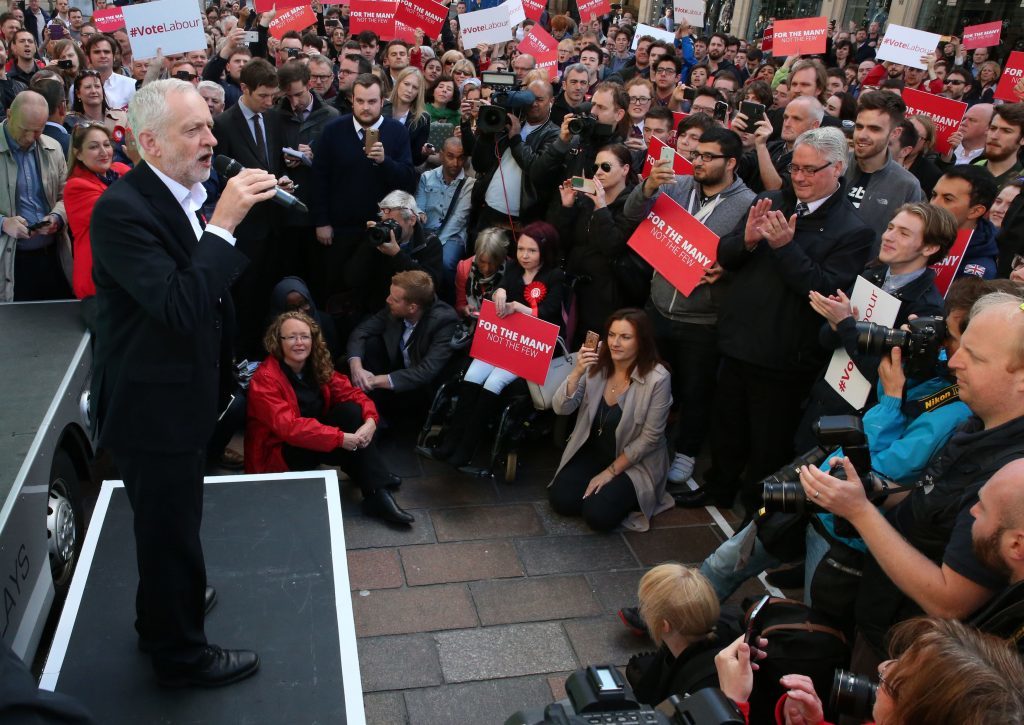 Labour leader Jeremy Corbyn speaking at a rally outside the Dune shoe shop in Glasgow while on the last full day of campaigning for the General Election. (Andrew Milligan/PA Wire)