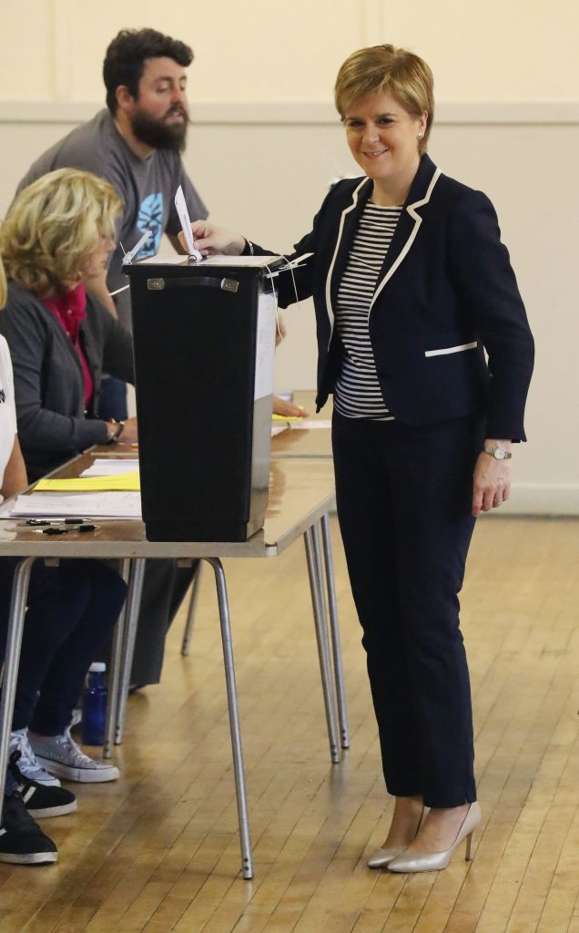 First Minister Nicola Sturgeon casts her vote (Andrew Milligan/PA Wire)