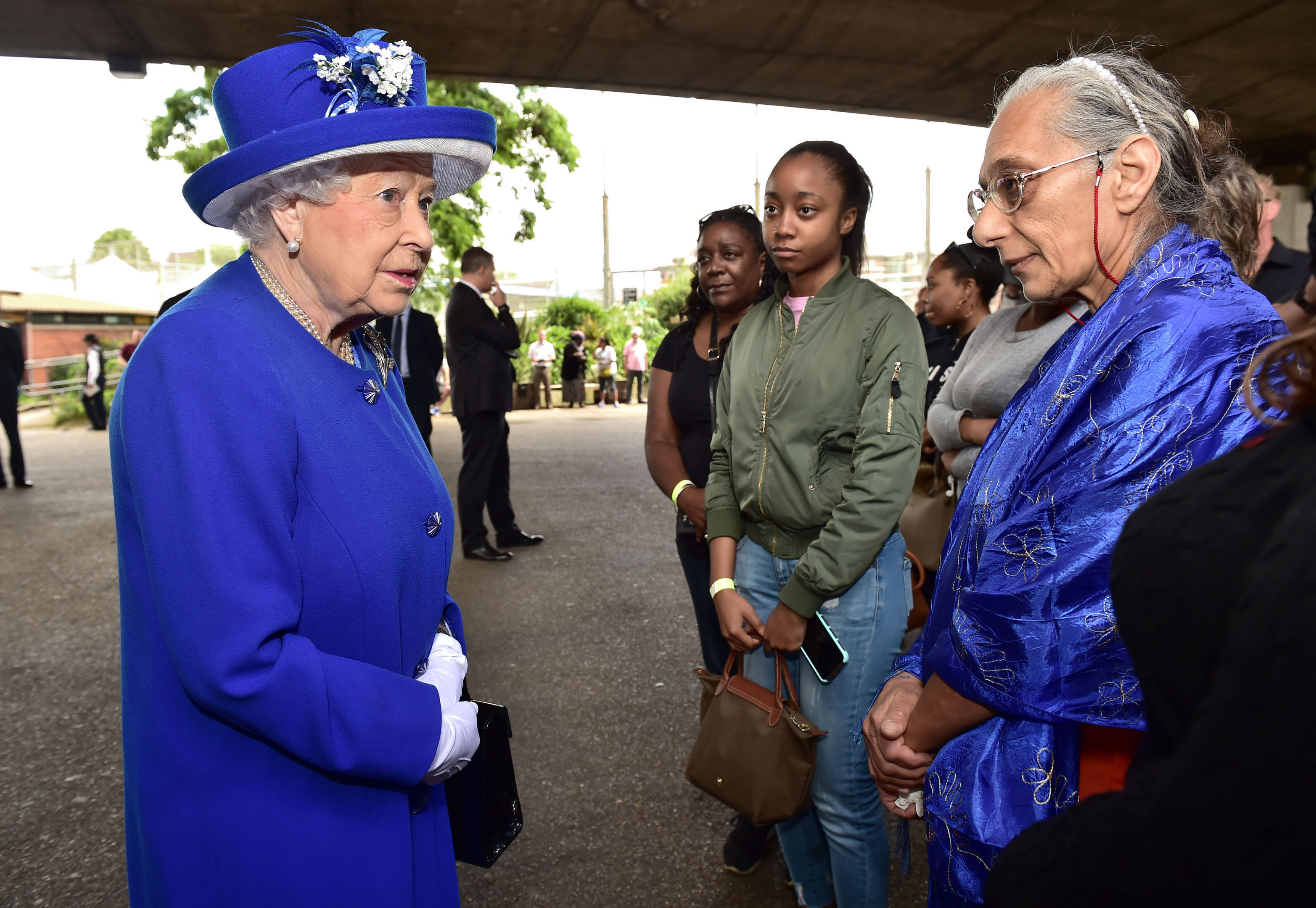 Queen Elizabeth II meets members of the community affected by the fire at Grenfell Tower (Dominic Lipinski/PA Wire)