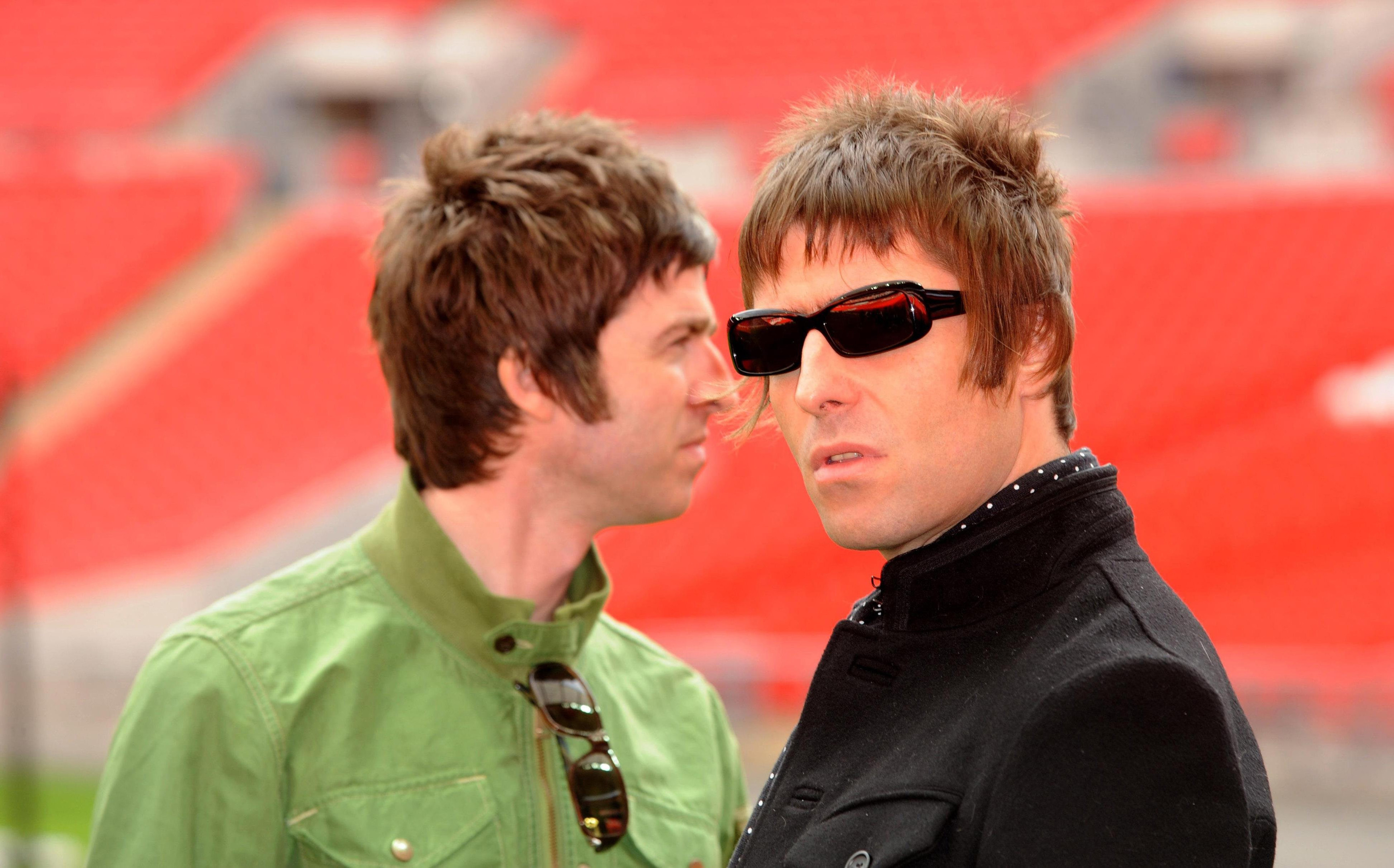 Noel Gallagher and Liam Gallagher (PA)