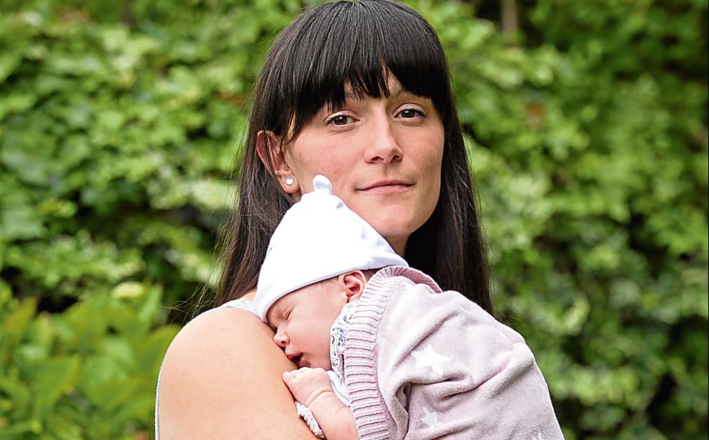 Natalie Russell with baby Lois (Andrew Cawley / DC Thomson)
