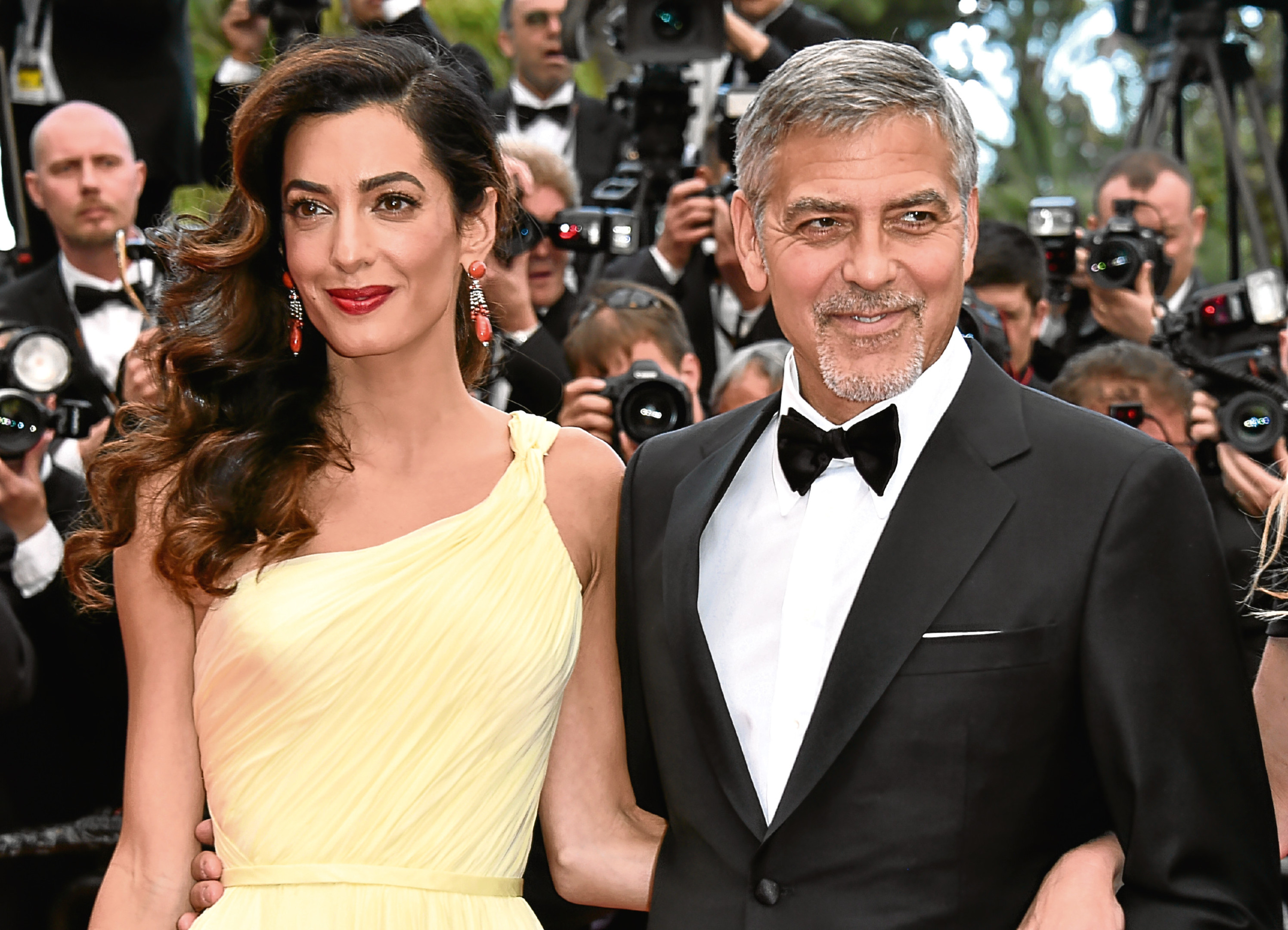 George and Amal Clooney (PA)