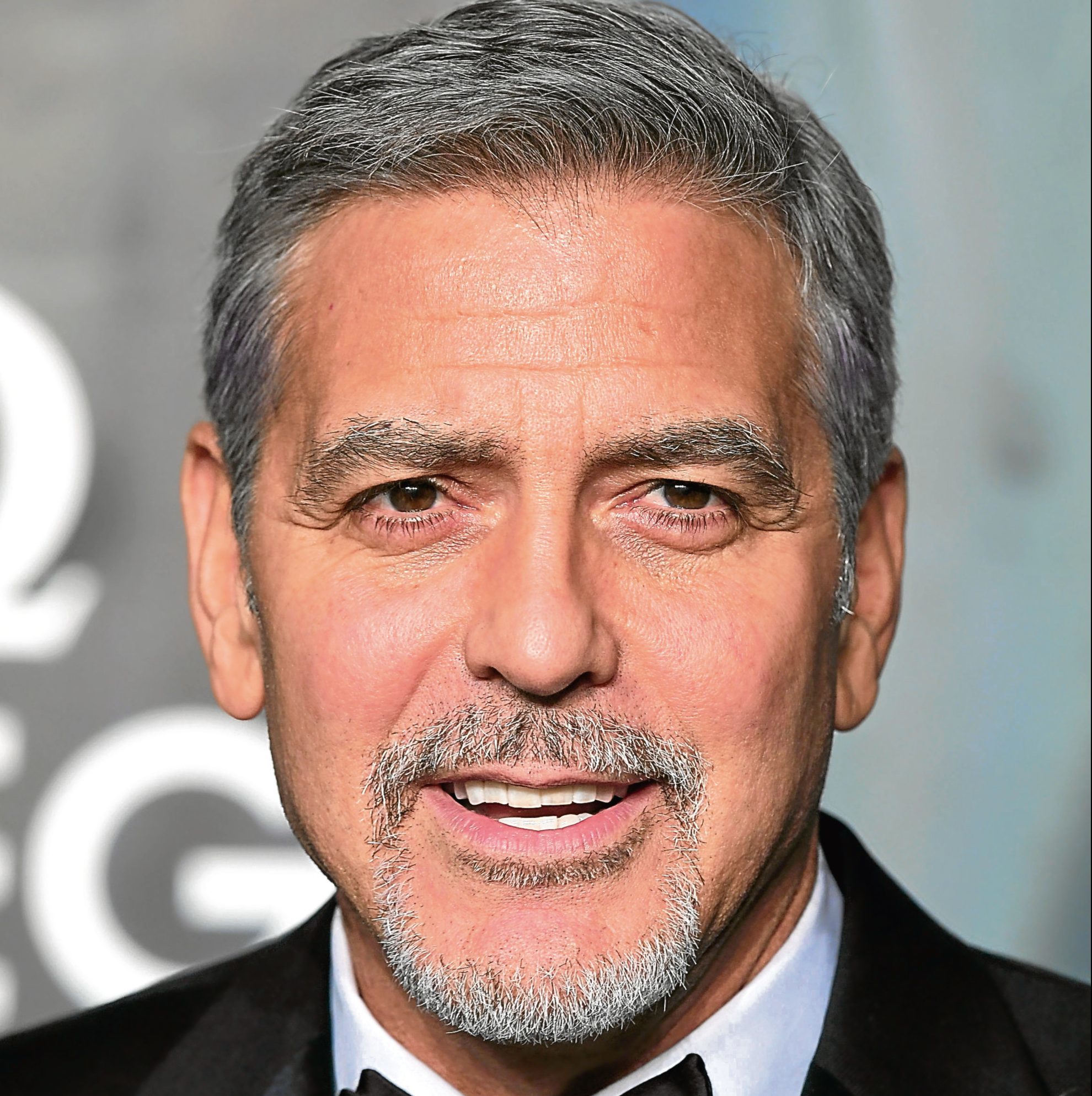 George Clooney who has threatened a magazine with prosecution (Ian West/PA Wire)