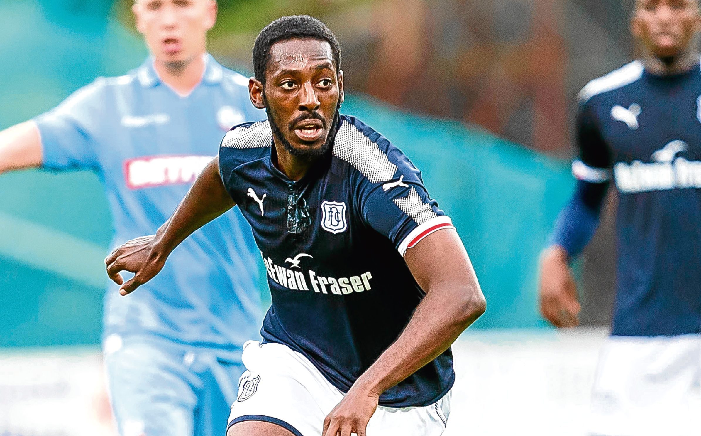 Roarie Deacon in action for Dundee (SNS Group)