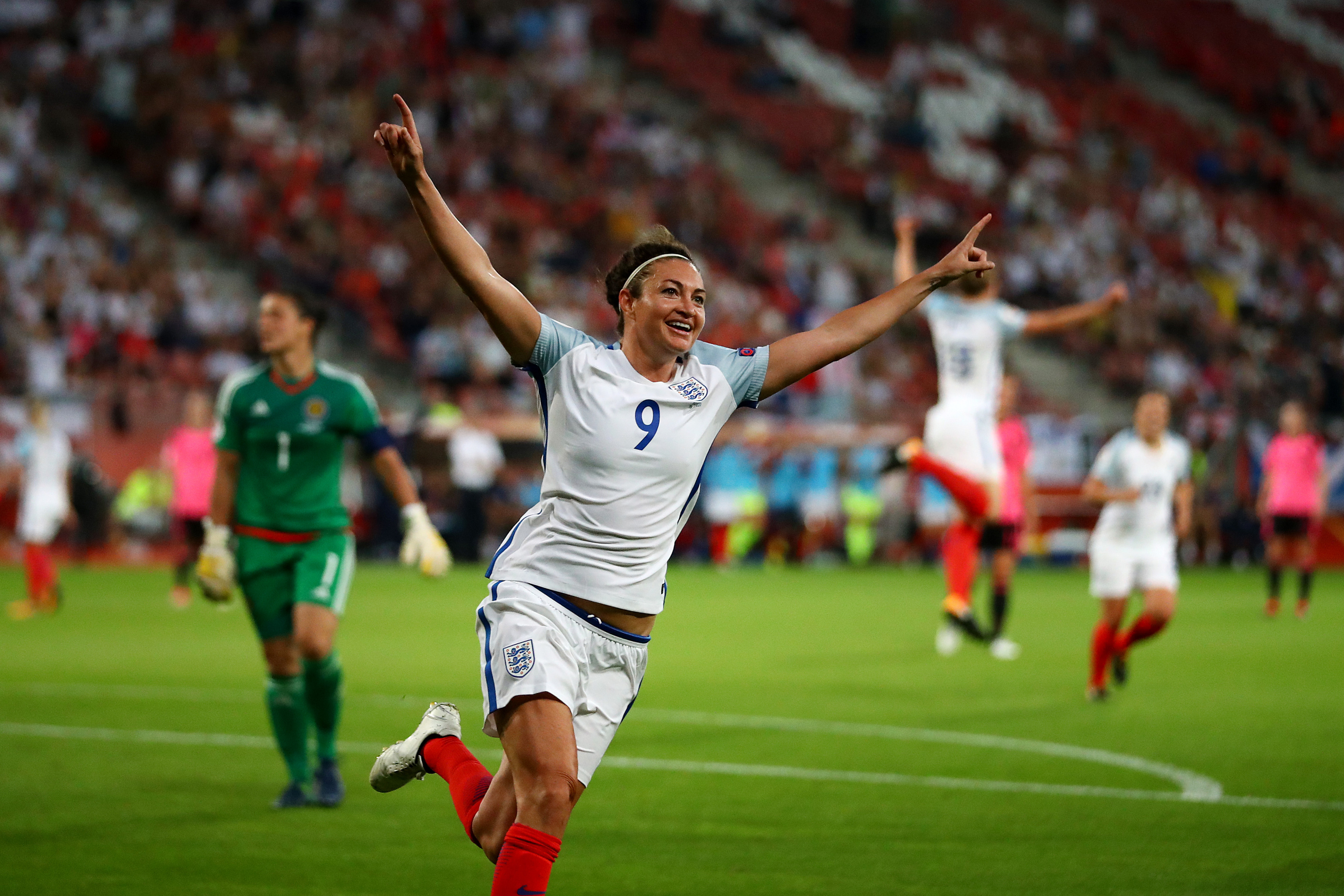 Jodie Taylor of England celebrates after scoring her hatrick (Dean Mouhtaropoulos/Getty Images)