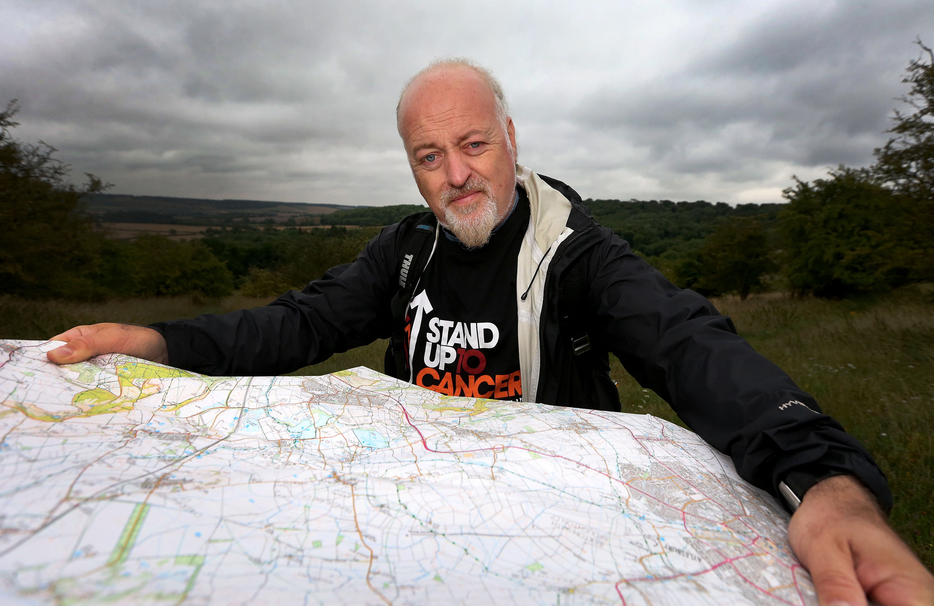 Bill Bailey who has begun a 100-mile cancer fundraising walk along Britain's "oldest road" in memory of his late nurse mother. (SNAP/Cancer Research UK/PA Wire)