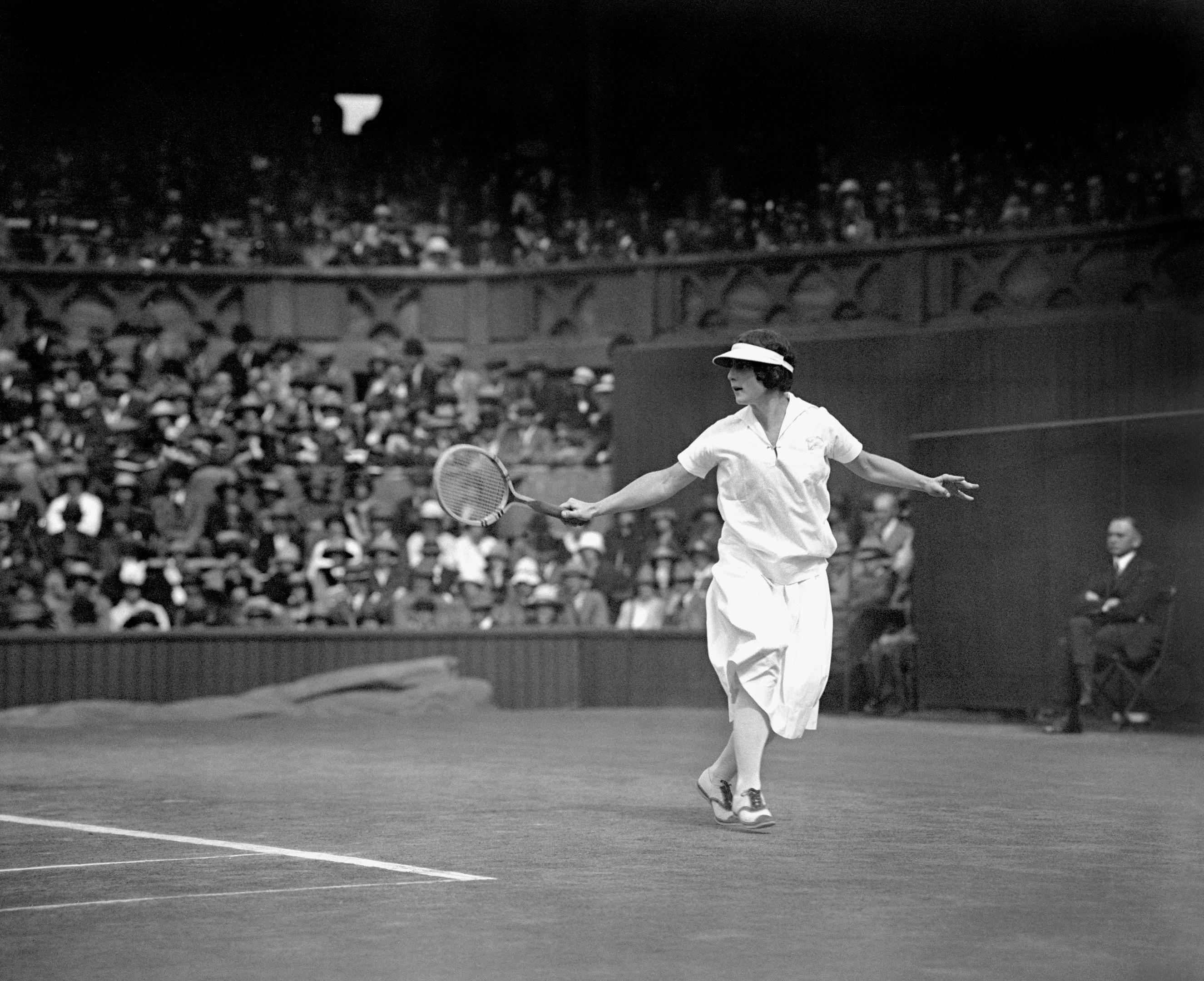 Helen Wills Moody in action - this time against Kathleen McKane in the Ladies tennis final at Wimbledon. (PA)