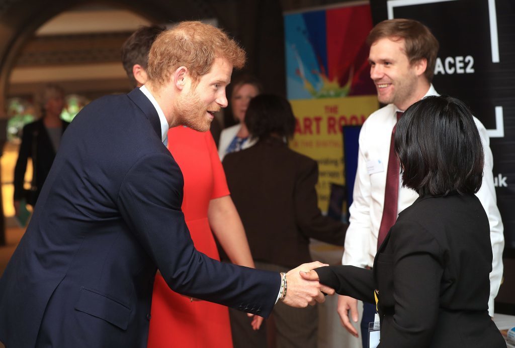 Prince Harry meets guests as he arrives for a visit to the Leeds Leads: Encouraging Happy Young Minds event, a charity fair and panel discussion aimed at highlighting the issues that affect the mental well-being of young people in the city and how organisations can support future generations. (Danny Lawson/PA Wire)