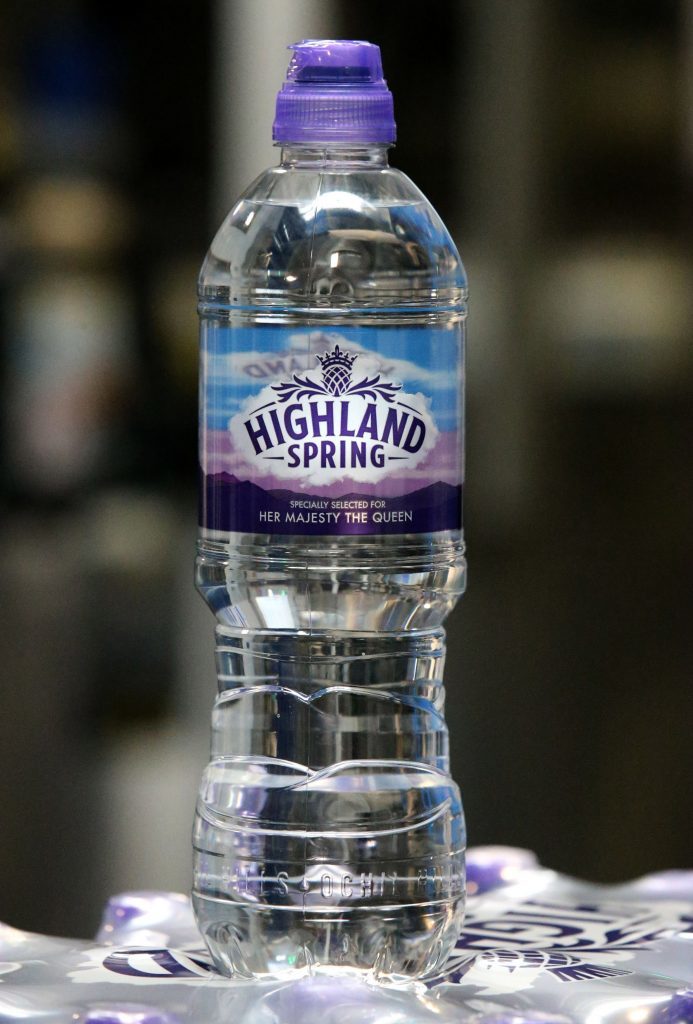 A bottle of Highland Spring with Queen Elizabeth II's name on it to commemorate her visit to the new Highland Spring factory building (Andrew Milligan/PA Wire)