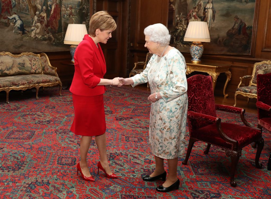 Queen Elizabeth II (right) greets Scotland's First Minister Nicola Sturgeon at an audience at the Palace of Holyroodhouse in Edinburgh. (Andrew Milligan/PA Wire)