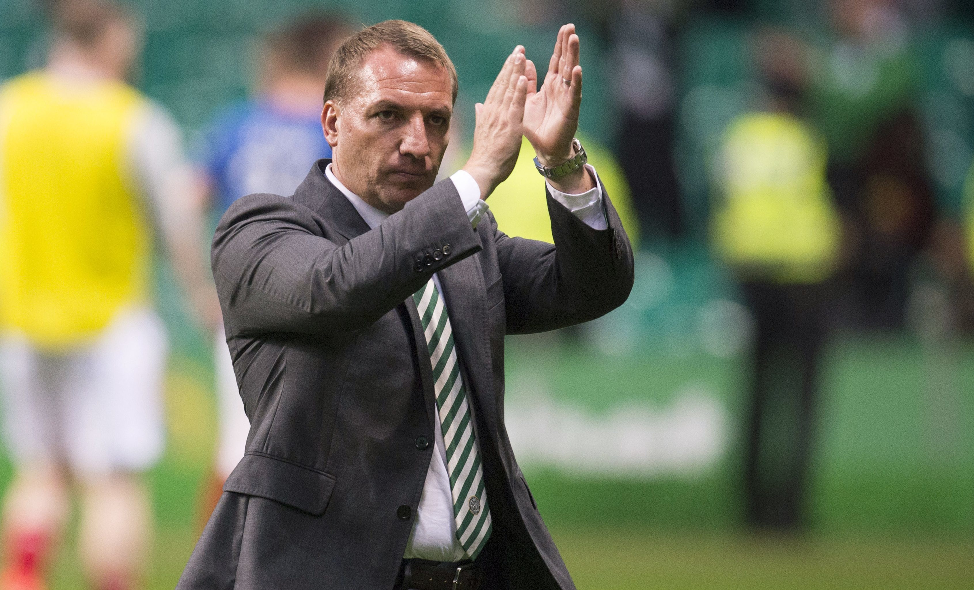 Celtic manager Brendan Rodgers applauds the fans at full time (SNS Group)