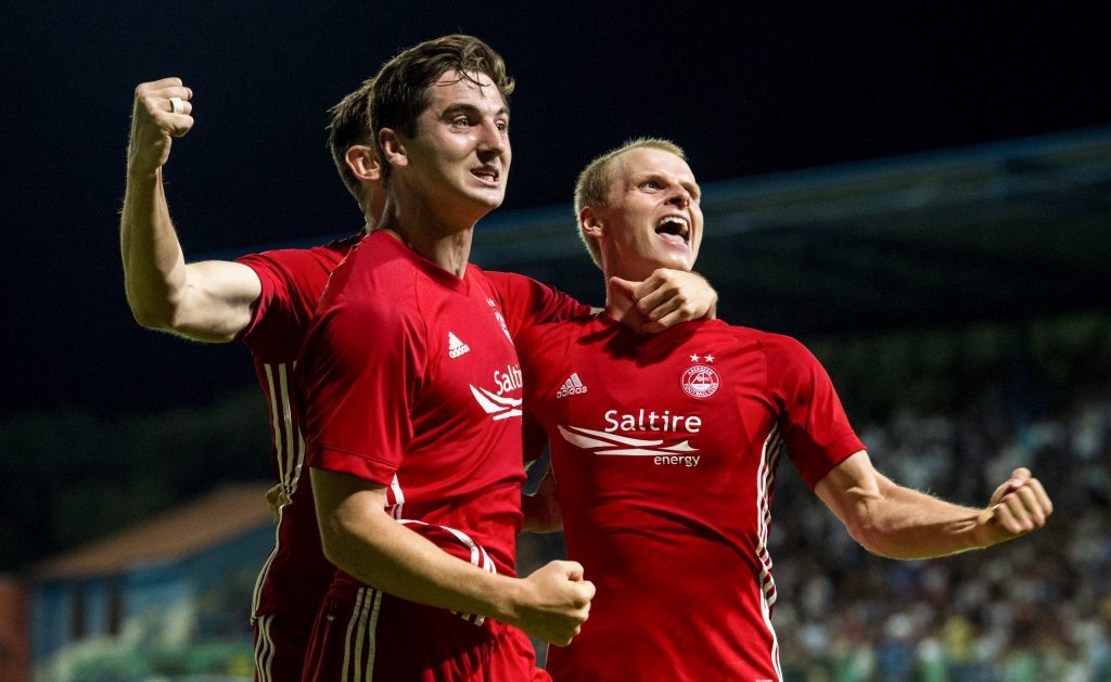 Aberdeen's Gary Mackay-Steven (right) celebrates his goal with Kenny McLean (centre) and Greg Tansey (SNS Group / Alan Harvey)