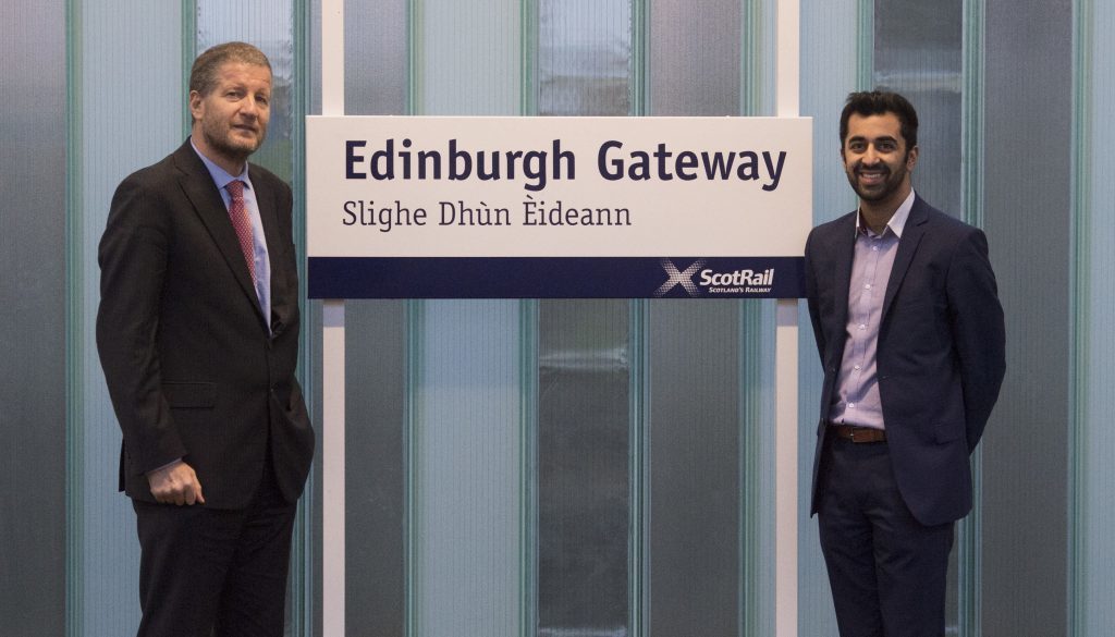 Former Scotrail Alliance managing director Phil Verster (left) joins Transport Minister Humza Yousaf as the Edinburgh Gateway Station is officially opened (PA)