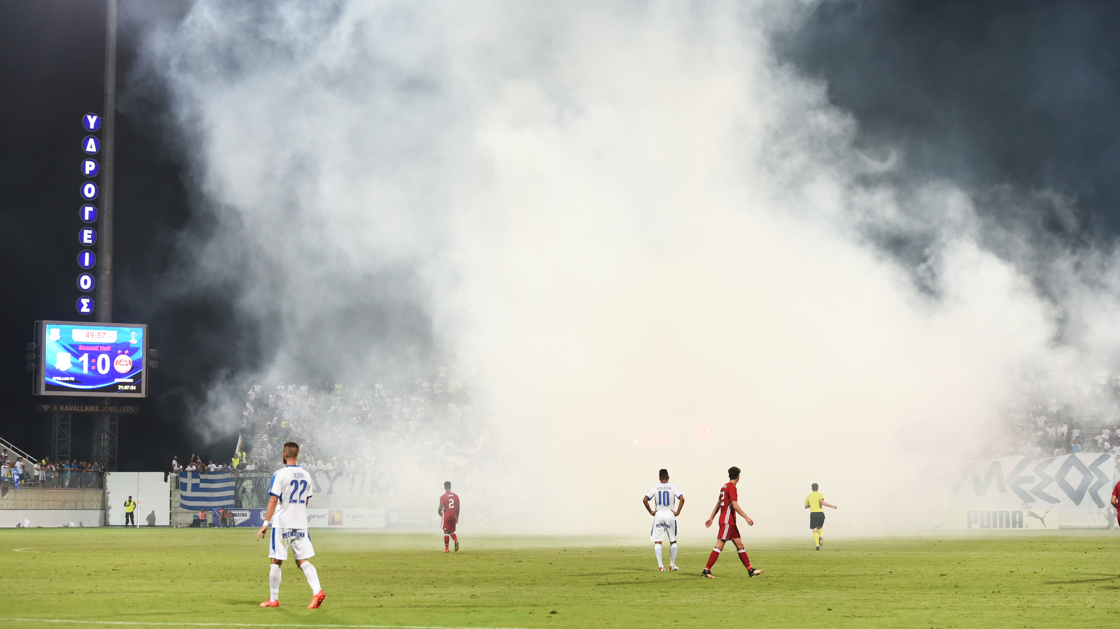 Flares were thrown onto the pitch from the home fans (SNS Group / Craig Foy)