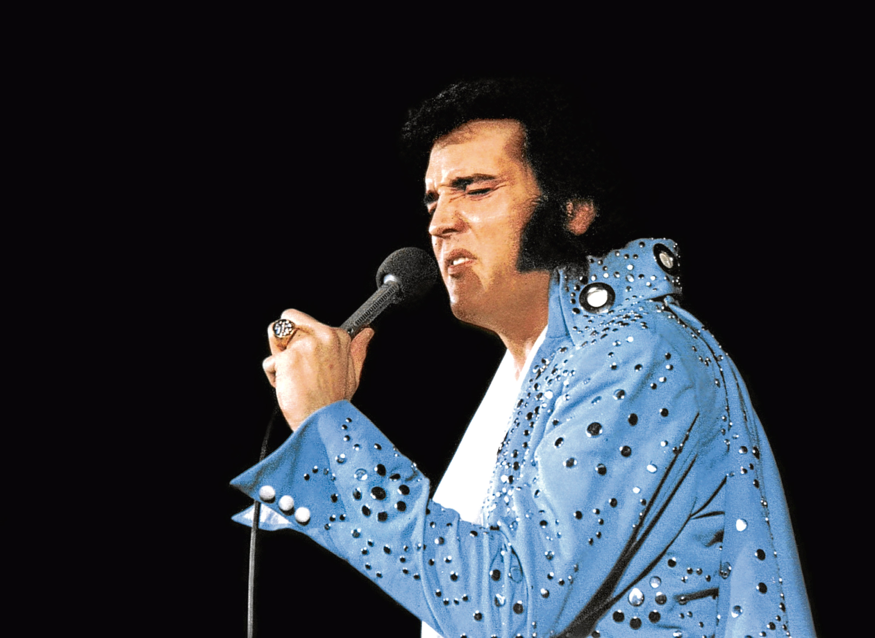Elvis starring as himself in Elvis On Tour, 1972 (Allstar/MGM)