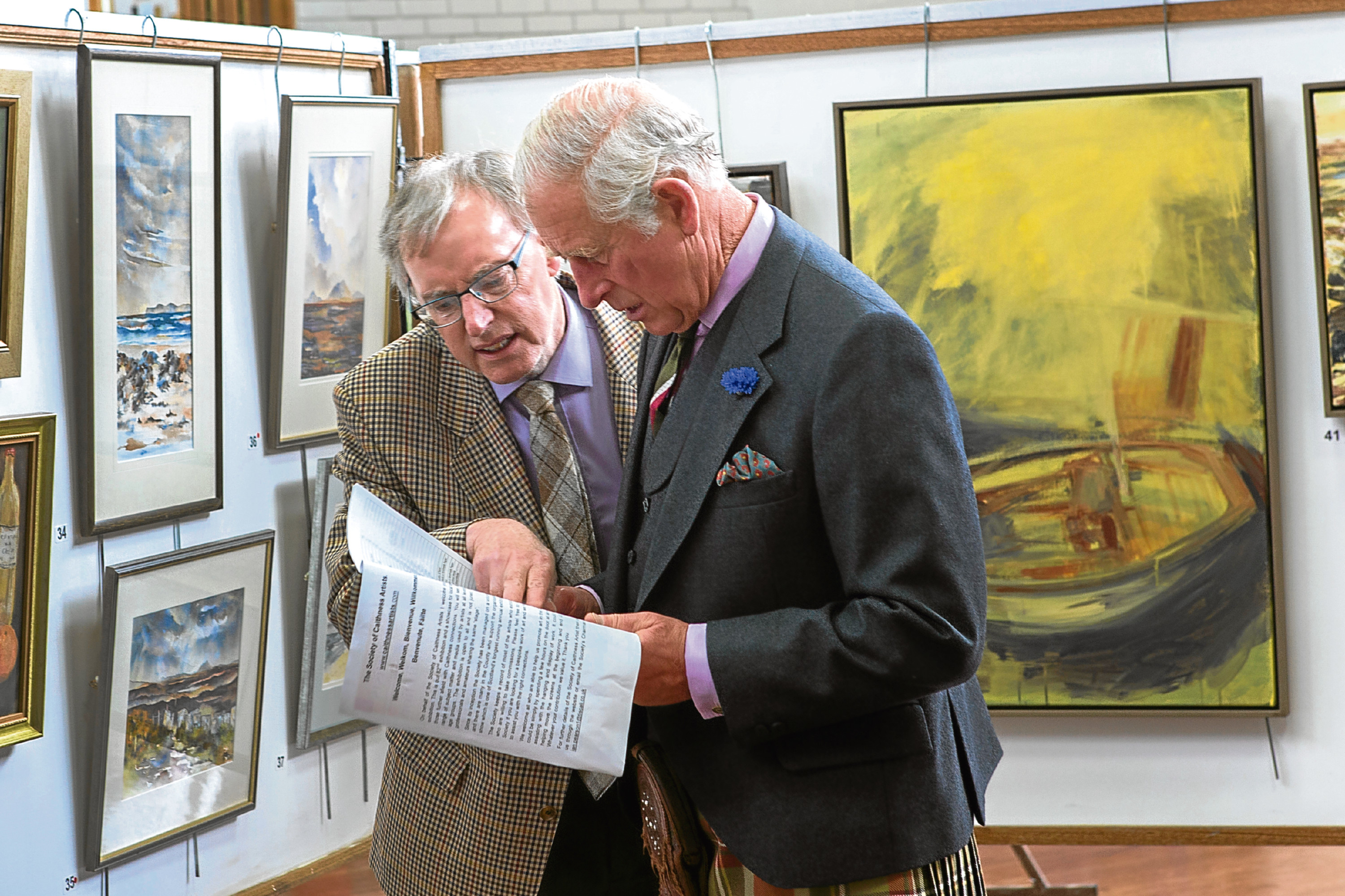 Prince Charles at the Thurso art exhibition, with Ian Pearson chairman of the Society of Caithness Artists (Robert MacDonald/Northern Studios)