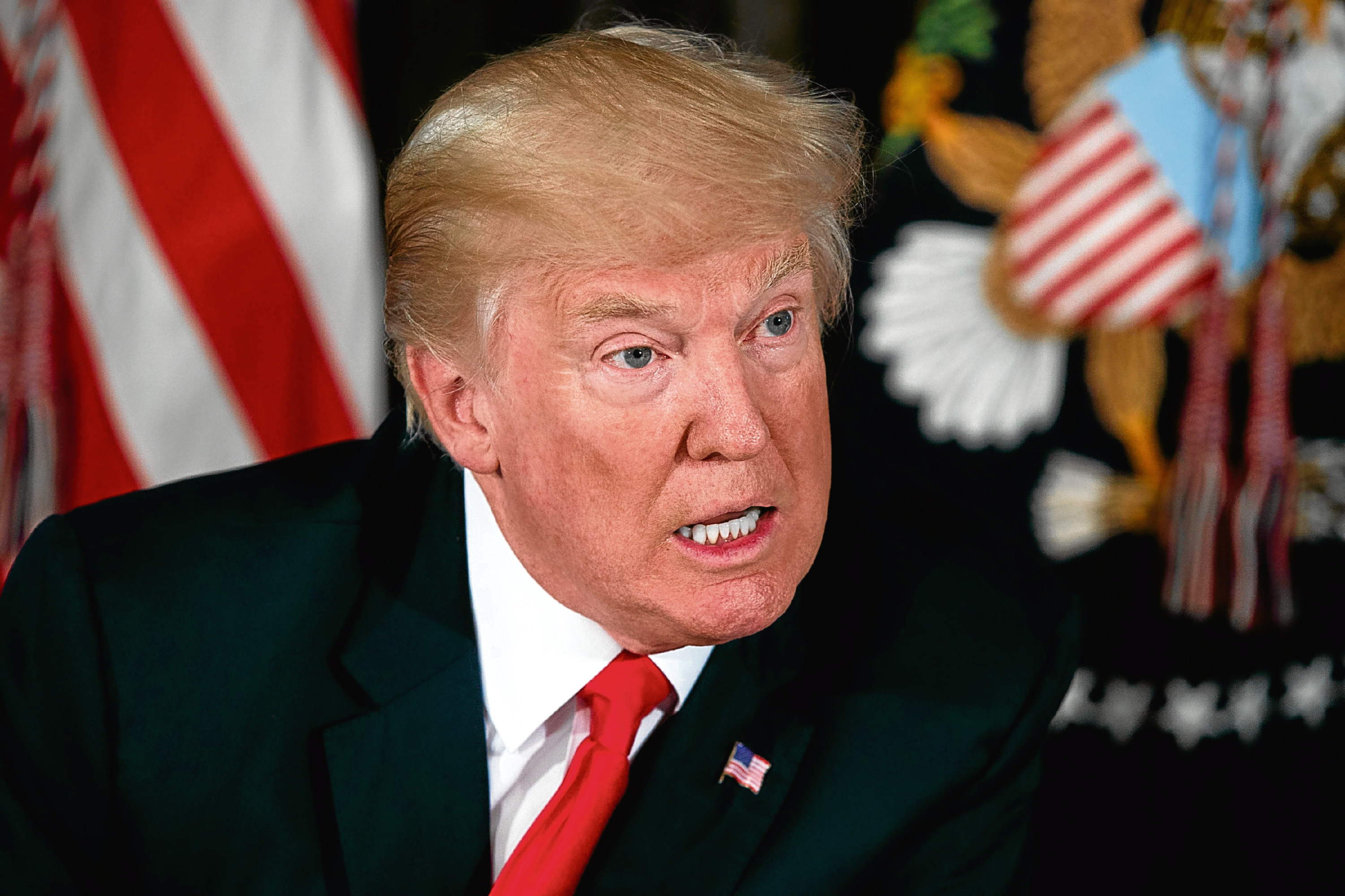 President Donald Trump speaks during a briefing on the opioid crisis, Tuesday, Aug. 8, 2017, at the Trump National Golf Club in Bedminster, N.J. (AP Photo/Evan Vucci)