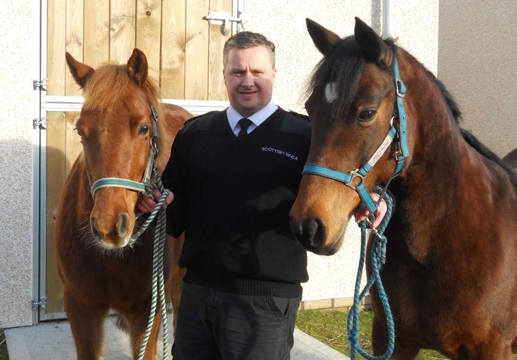 Danny and Lucky with centre manager Graeme Innes (Scottish SPCA)