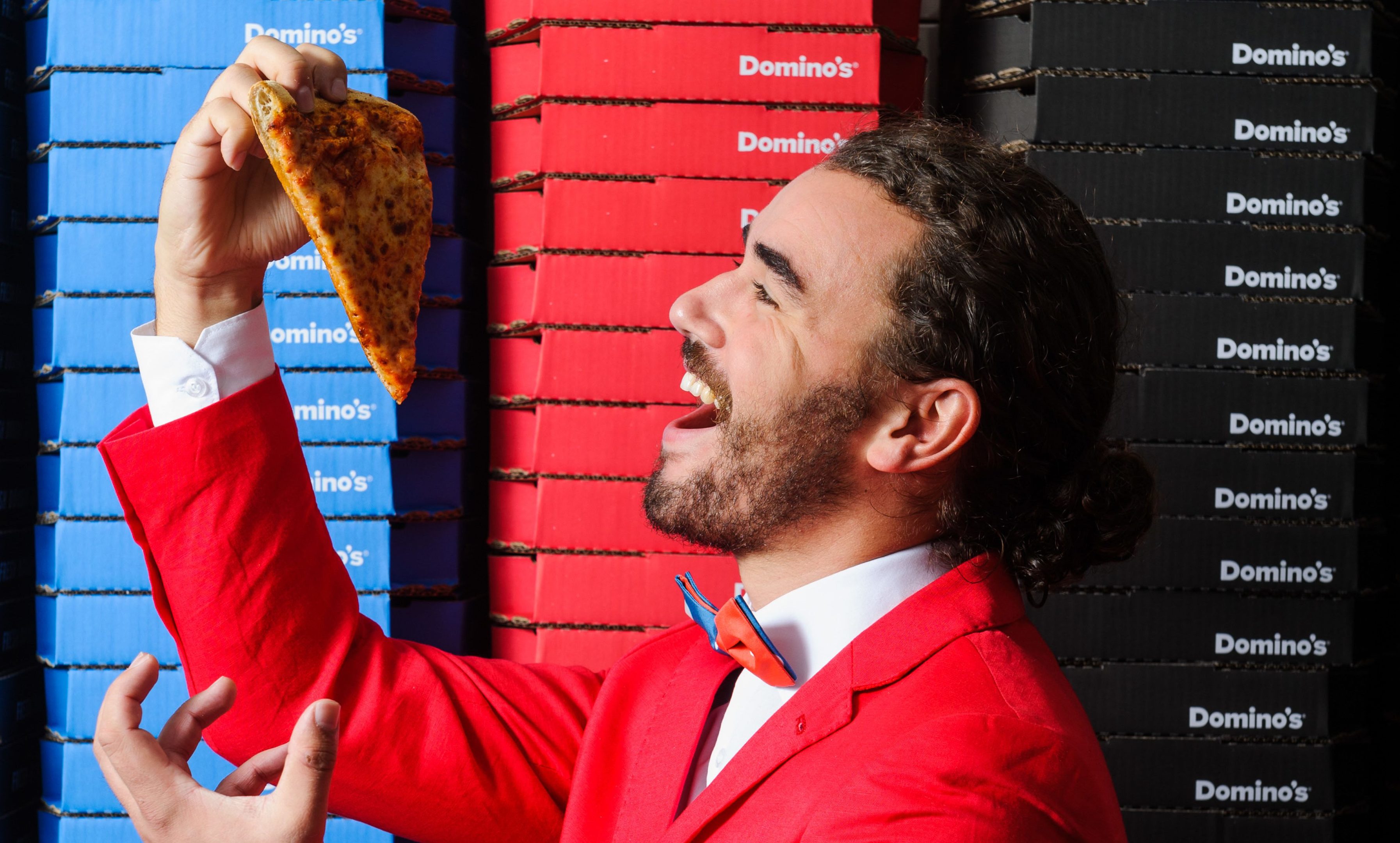 Domino’s is celebrating its 20th anniversary in Wales by giving away free pizza to anyone who sings their order around the country. The first 20 people to sing their order in every store across Wales will be rewarded with a free pizza. (James McCauley / Domino’s)