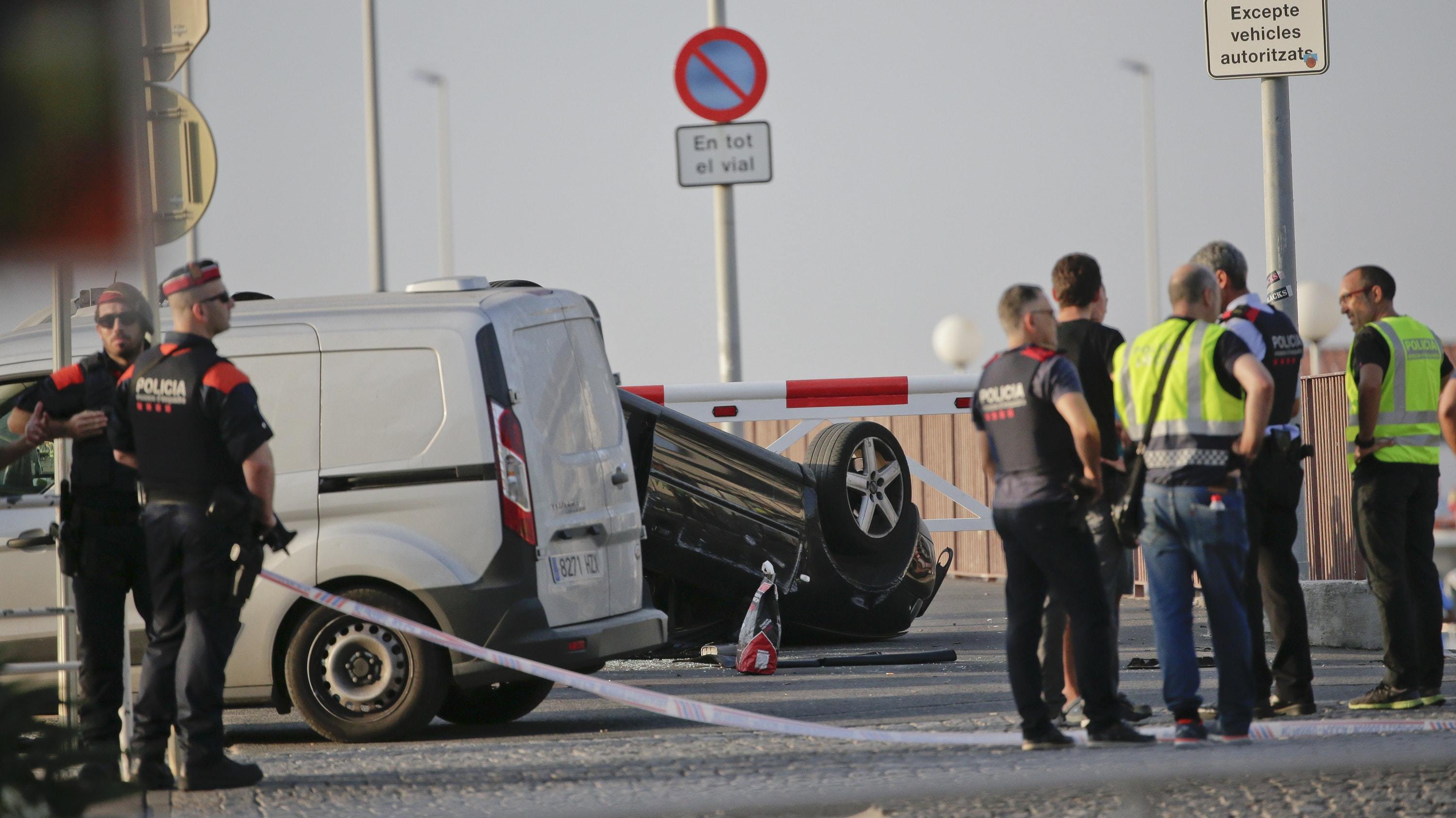 An overturned car at the spot where terrorists were intercepted by police in Cambrils, Spain (Emilio Morenatti/AP)