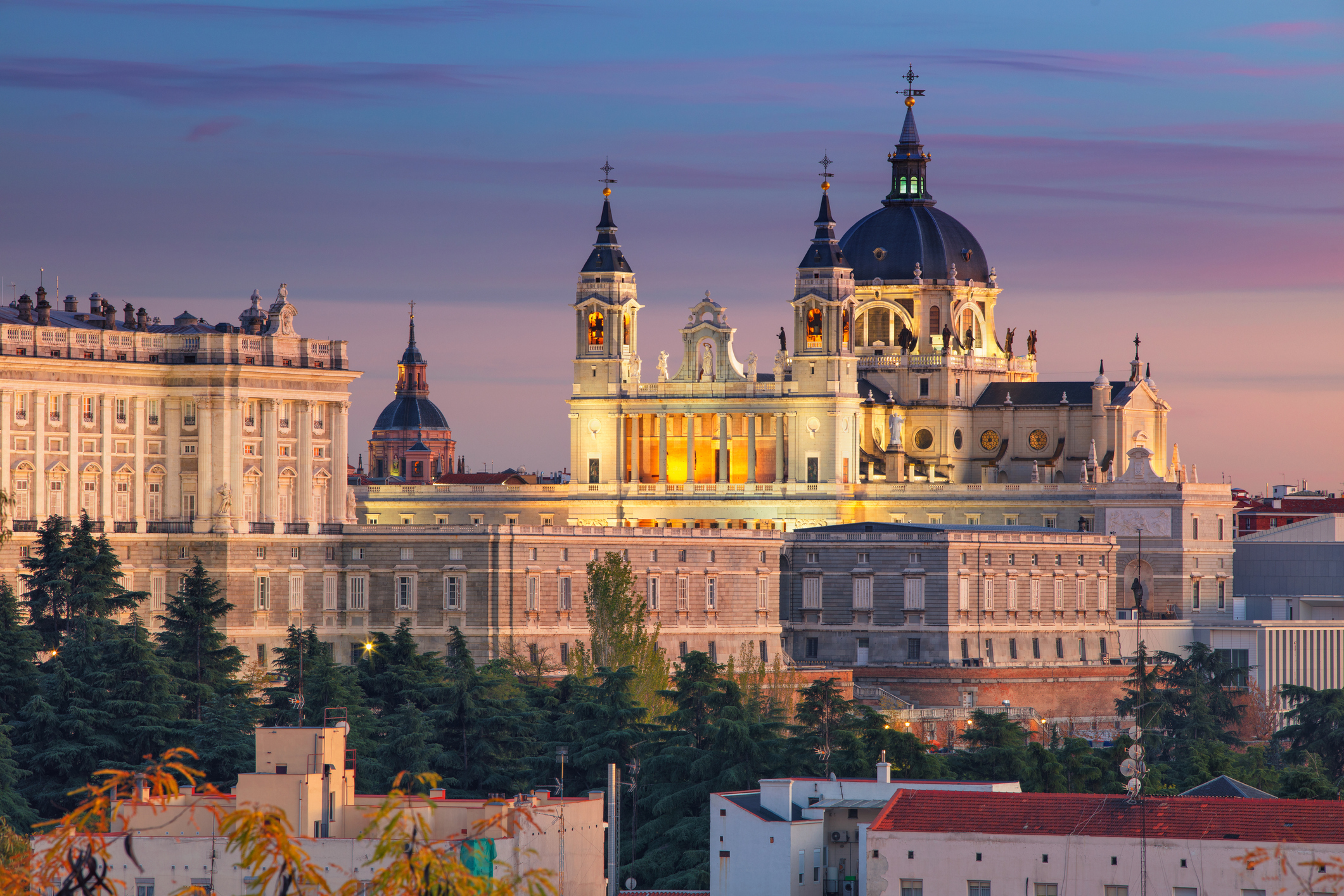 Santa Maria la Real de La Almudena Cathedral and the Royal Palace during sunset (Getty Images)