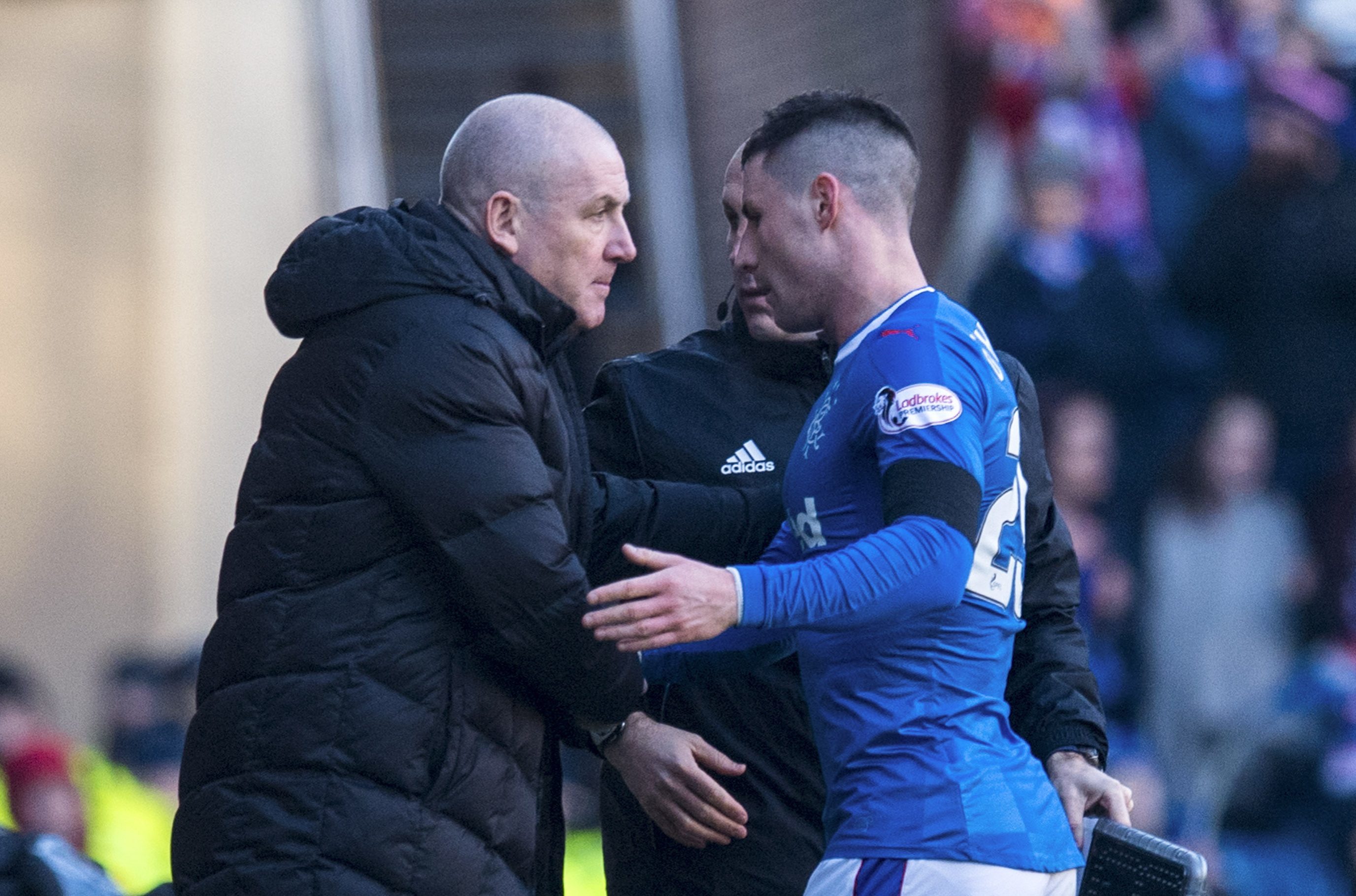 Rangers manager Mark Warburton (left) with Michael O'Halloran (PA)